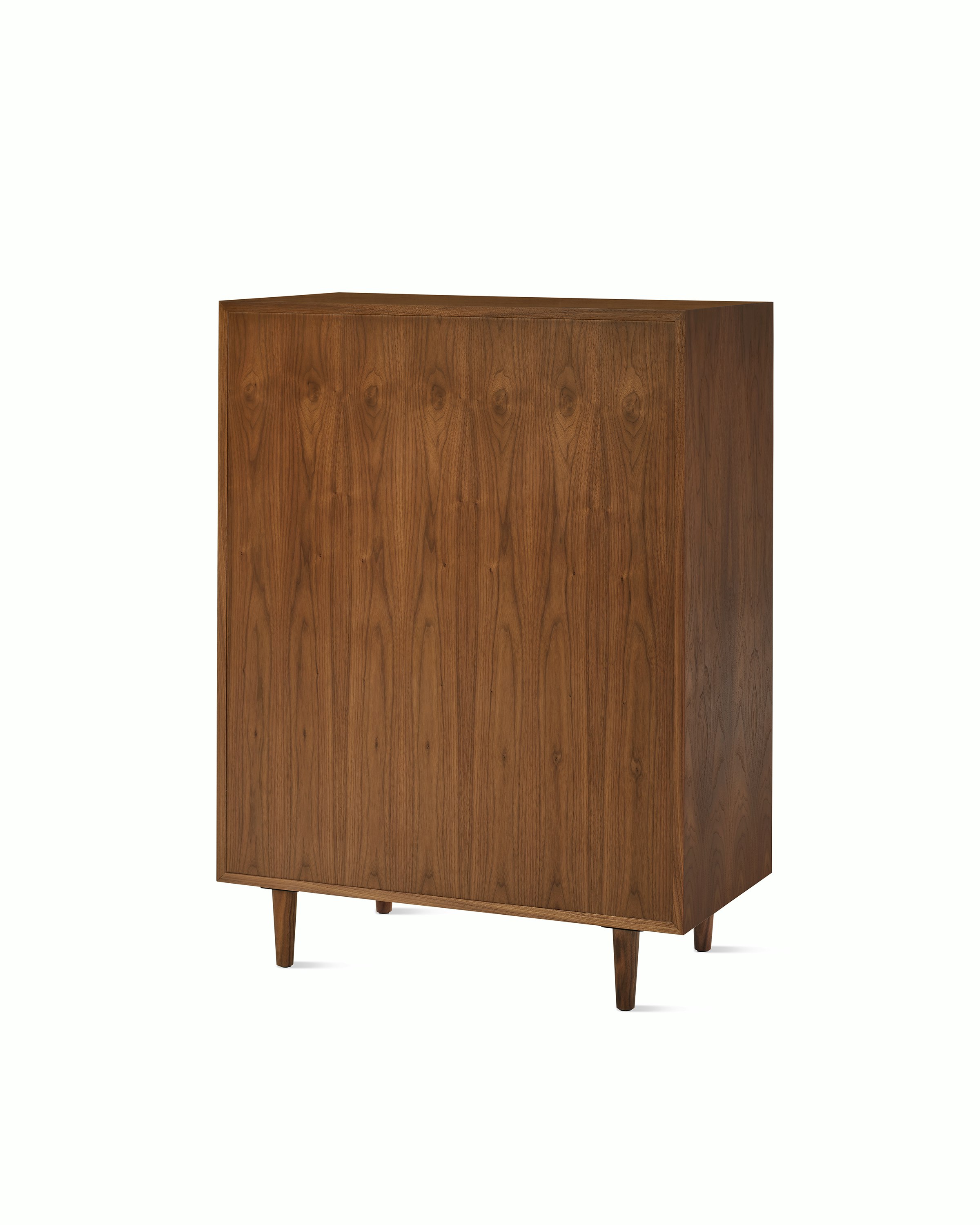 Nelson Basic Cabinet Series Console in walnut, two doors, three drawers, taper legs, cupcake pulls.