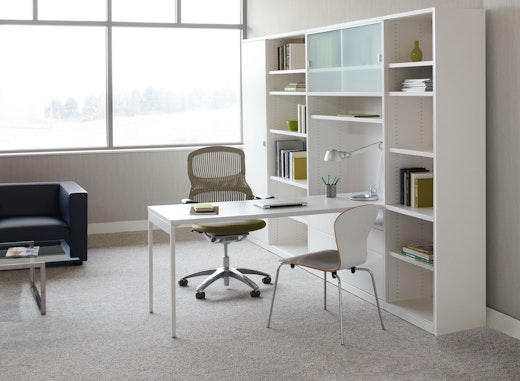 Template storage system puts the worksurface front and center, keeping active work visible and accessible.