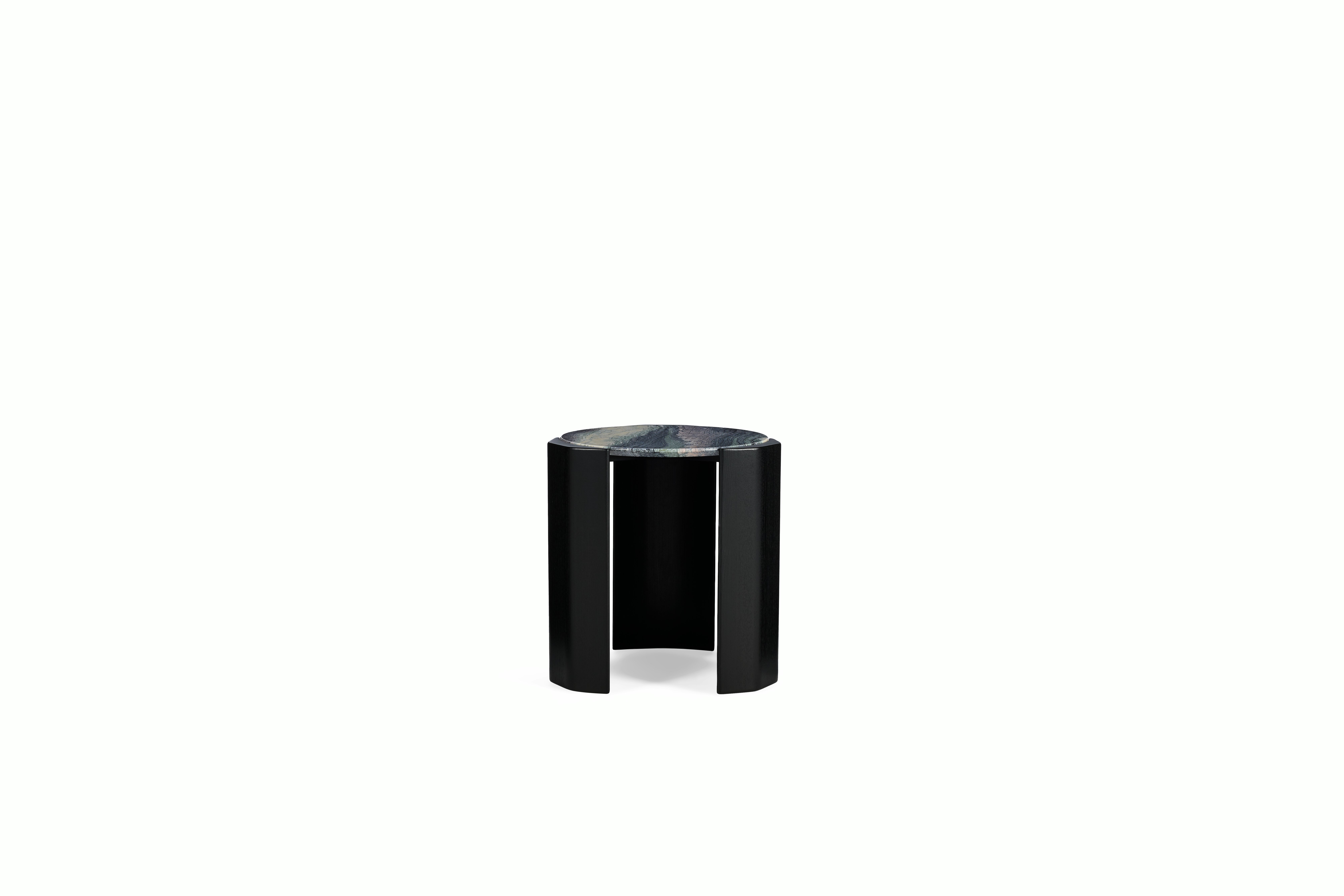 A Atlason Organic Slab Side Table in Black Ash viewed from behind.