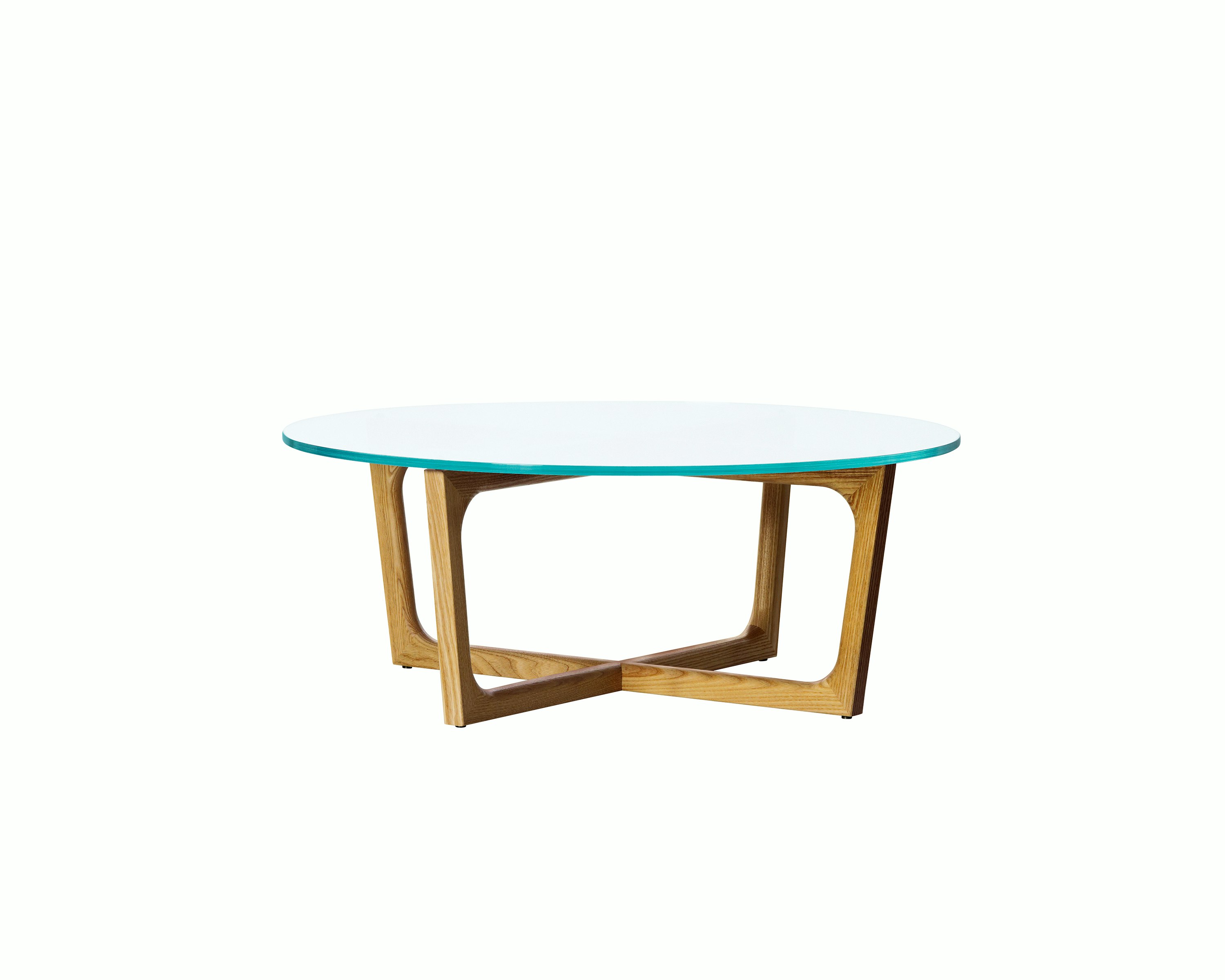 A round Loophole coffee table with a glass top and a walnut base.