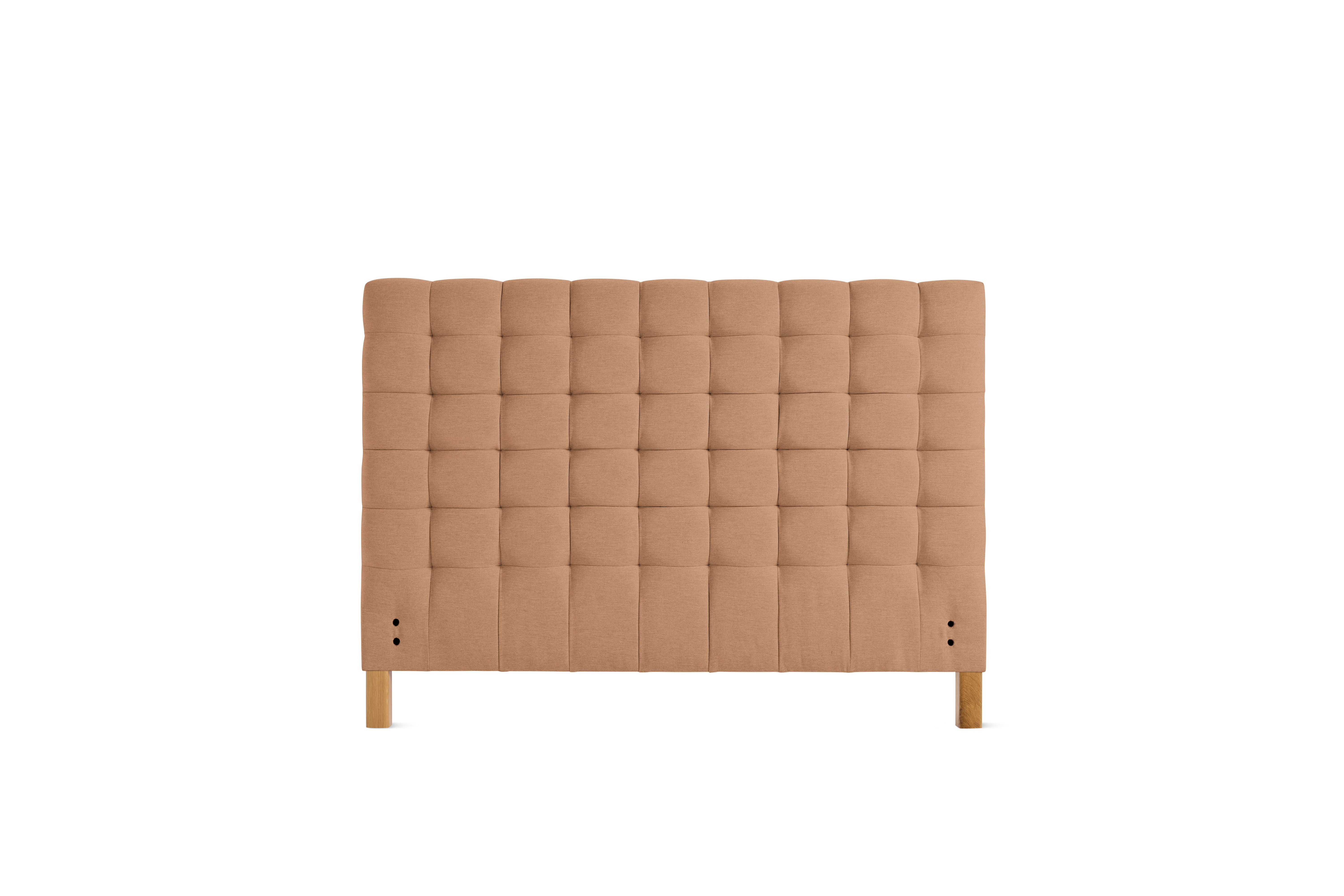 A Madeleine Headboard in Mode, Camel, Oak viewed from the front.