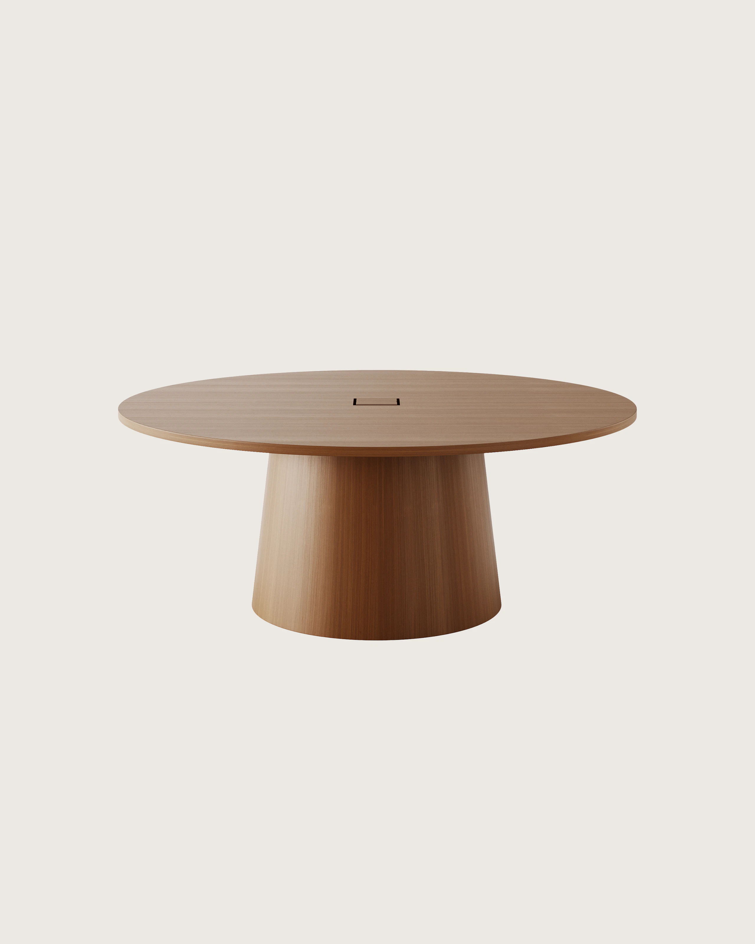 JD Meeting Table with round top and round tapered base in natural quarter cut walnut shown front-facing on a white sweep.