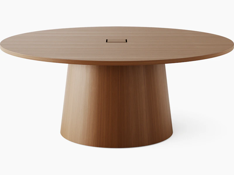 JD Meeting Table with round top and round tapered base in natural quarter cut walnut shown front-facing on a white sweep.