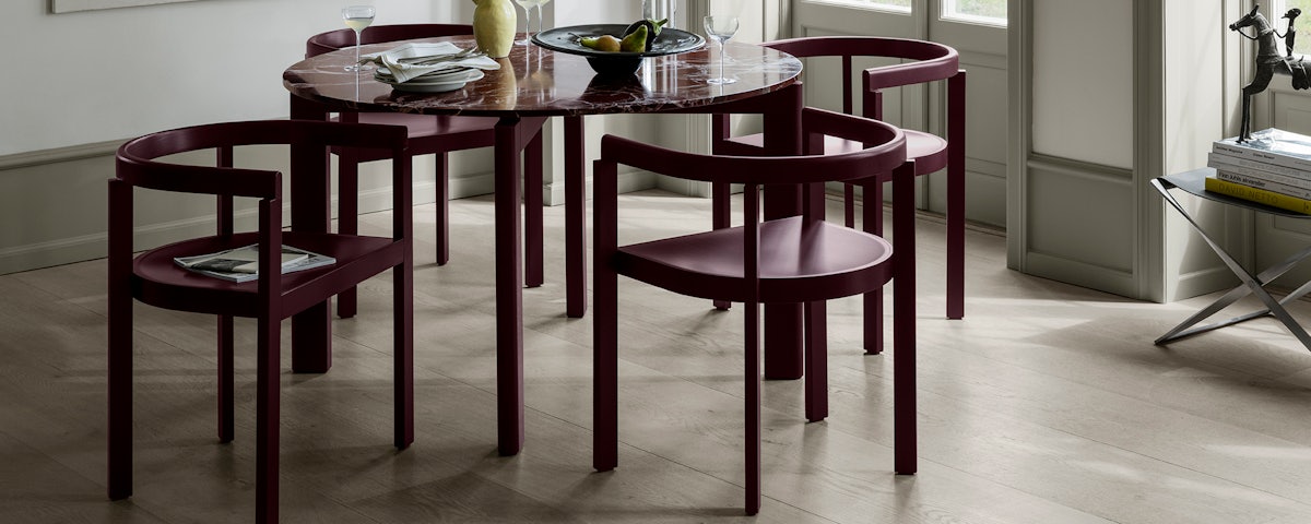 Four After Series Armchairs around a dining table