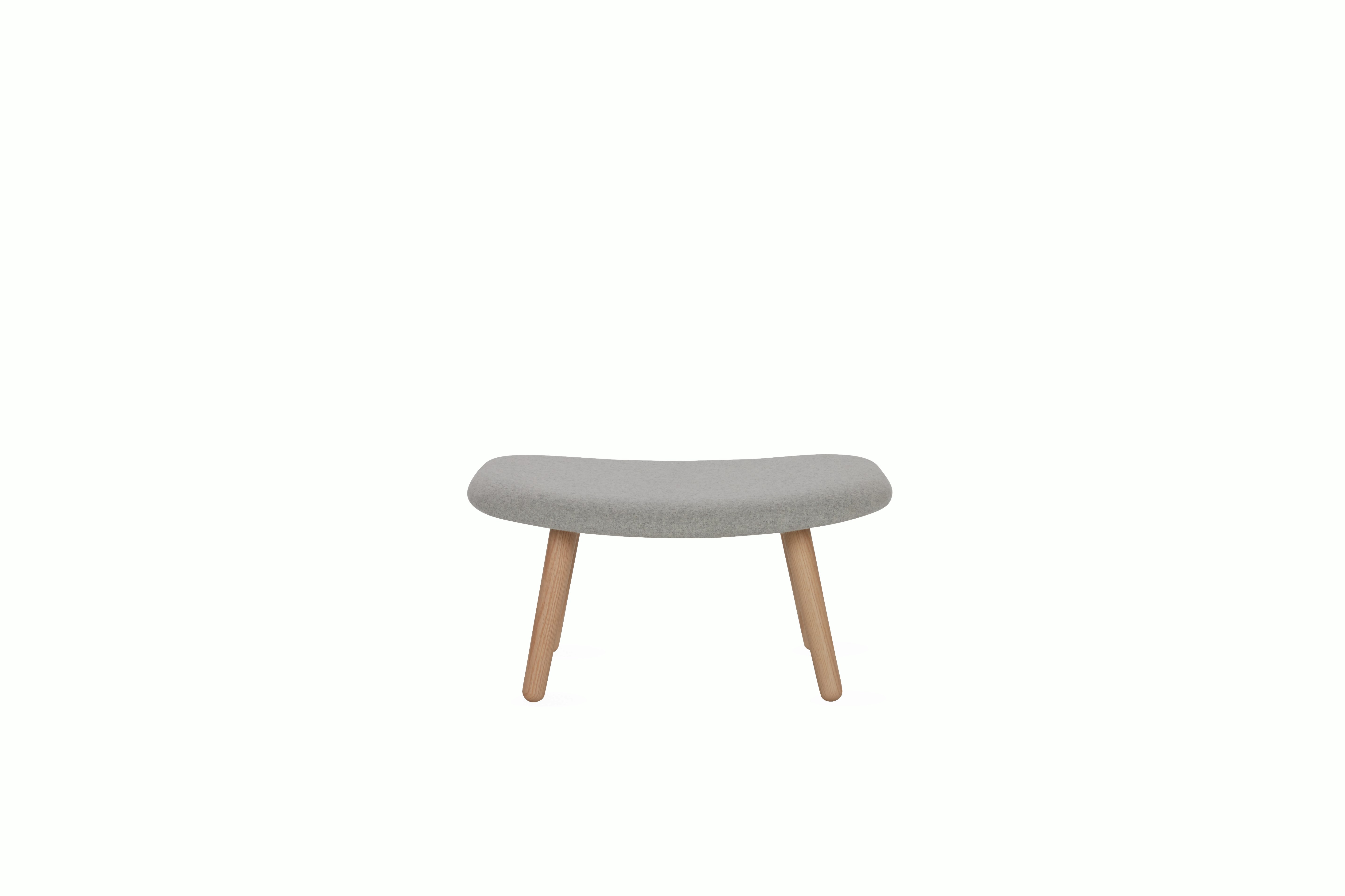 A light grey About A Lounge 03 Ottoman viewed from the front