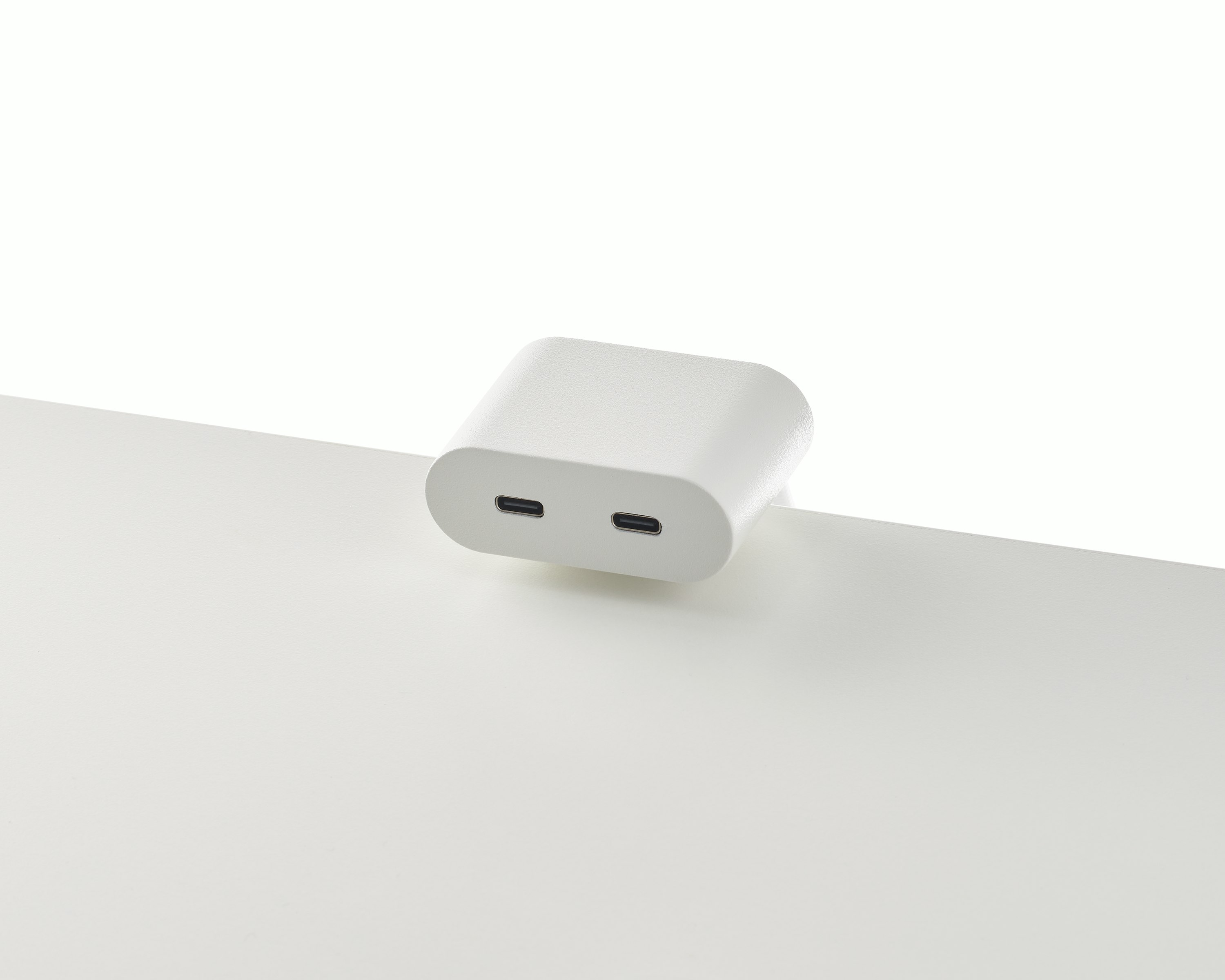 Clamp on USB-C power solution shown in white.