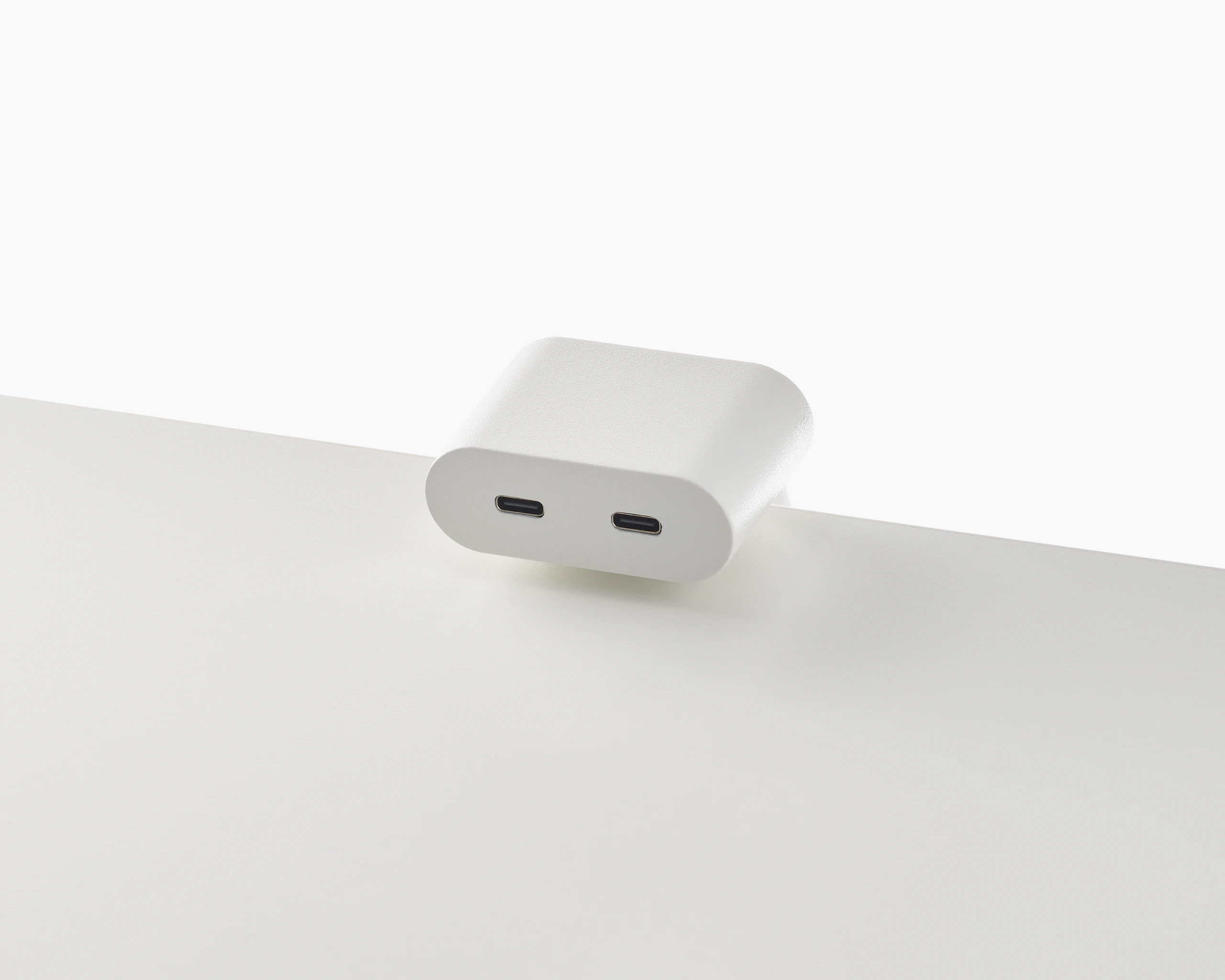 Clamp on USB-C power solution shown in white.