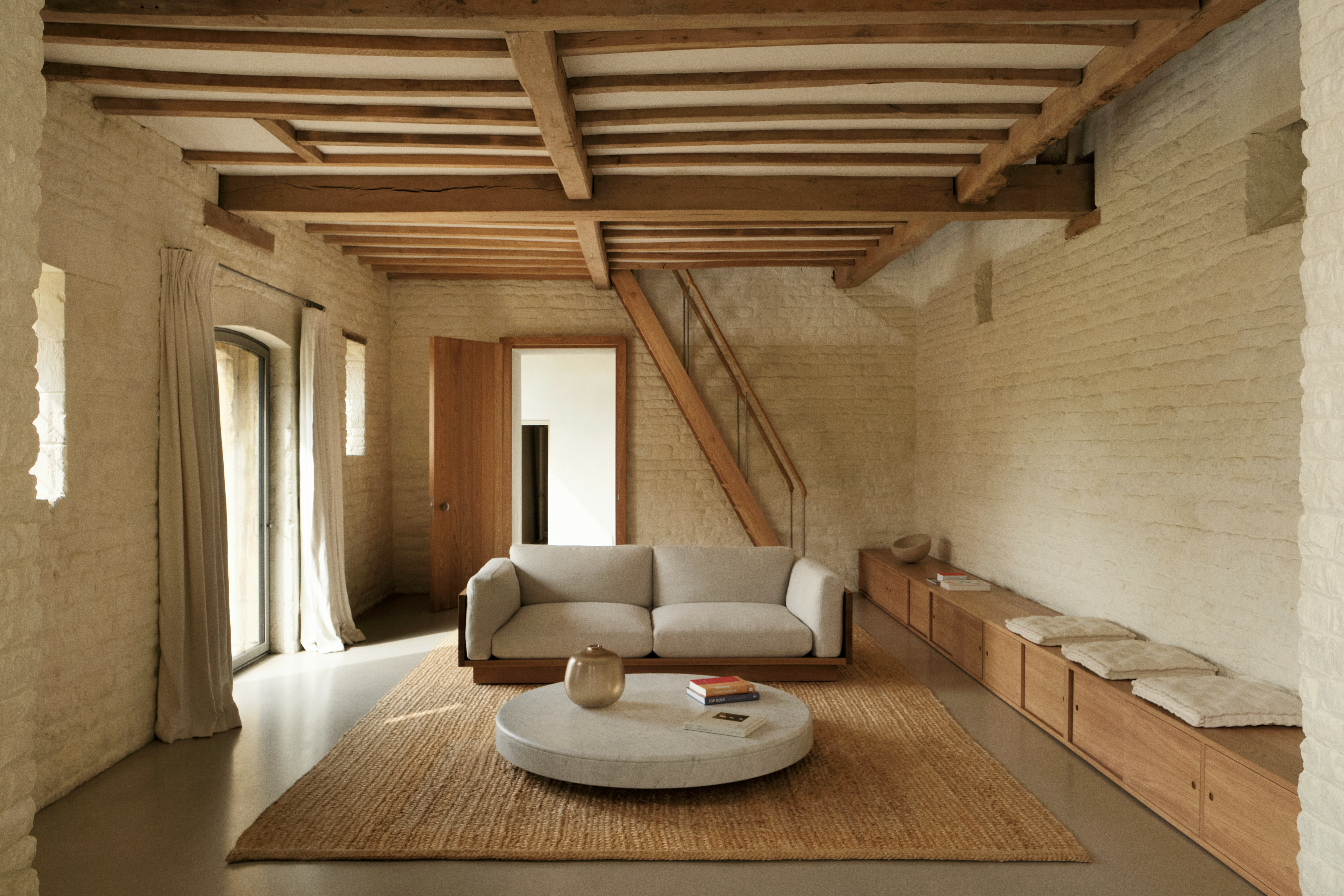 Pawson Drift Sofa in oak and white textile in an oak clad room at the Pawson Home Farm
