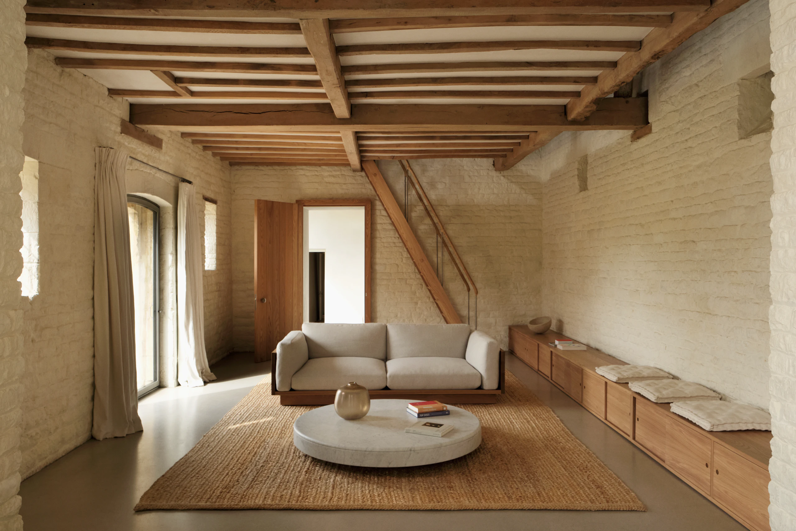 Pawson Drift Sofa in oak and white textile in an oak clad room at the Pawson Home Farm