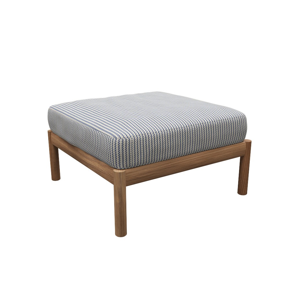 A Tradition Outdoor Pouf in Navy viewed from an angle.