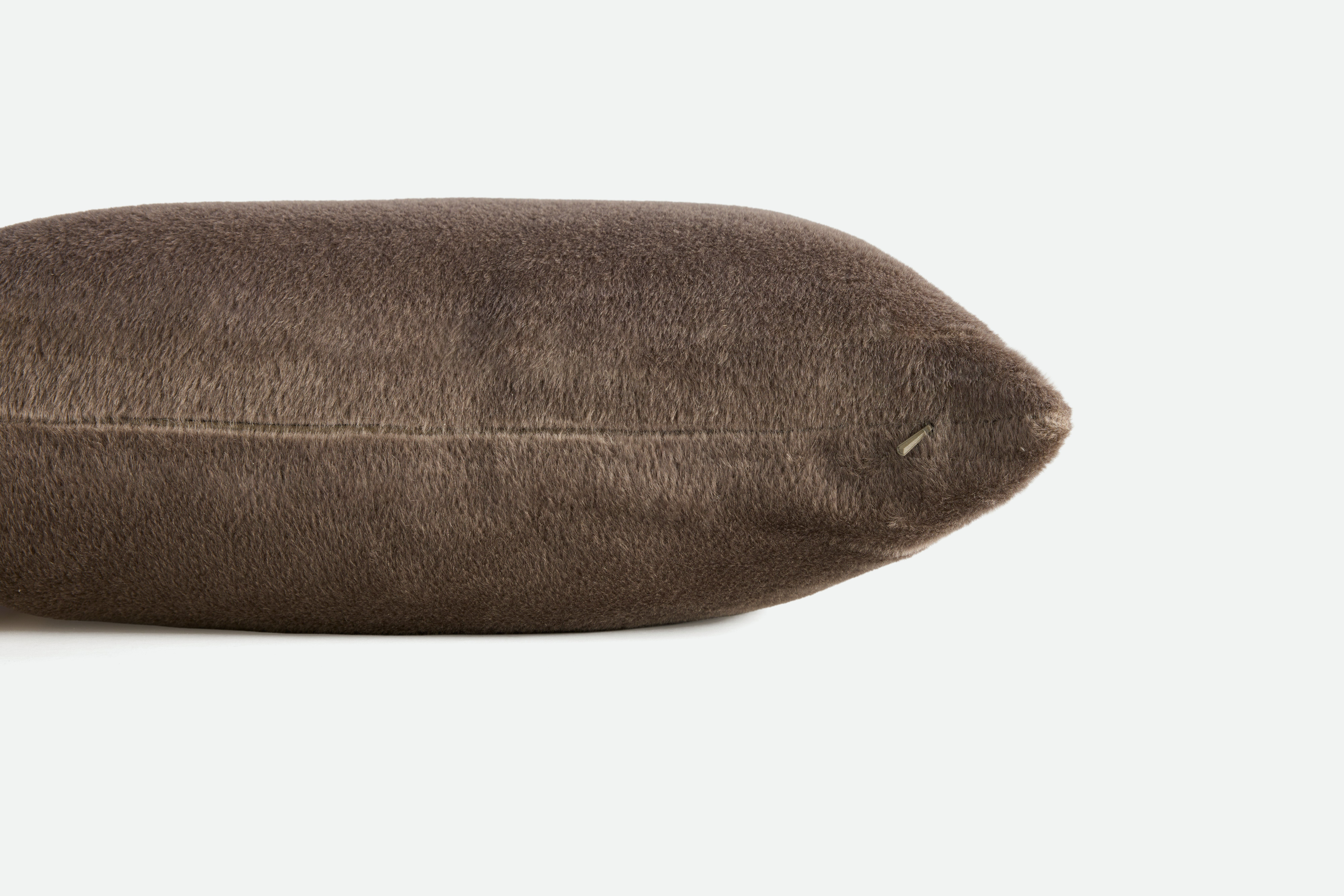 A detailed look at a Holly Hunt Royal Alpaca Pillow in Brownstone.