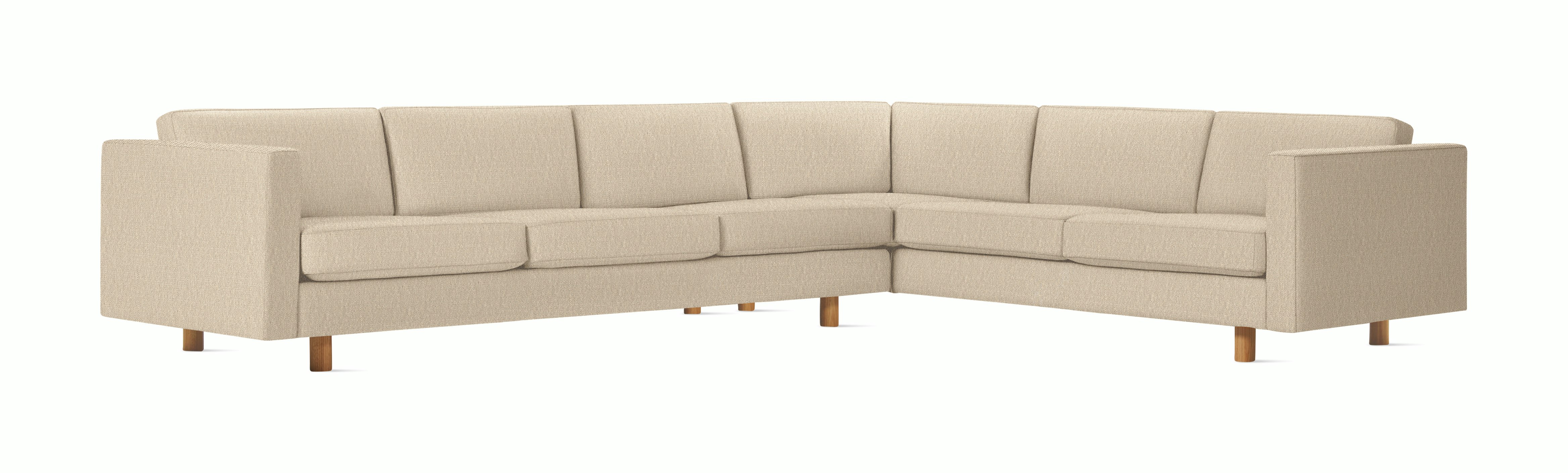 A Lispenard Corner Sectional in Gentle with Oak finish viewed from the front.
