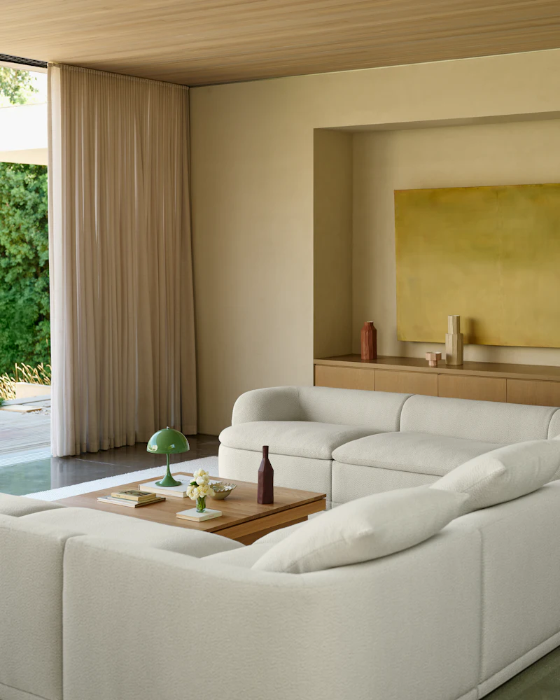 Living room with white sofa and Pawson Drift coffee table.