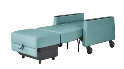 A front three-quarter view of a light blue Gemma Sleep Chair by Herman Miller in the sleep configuration.