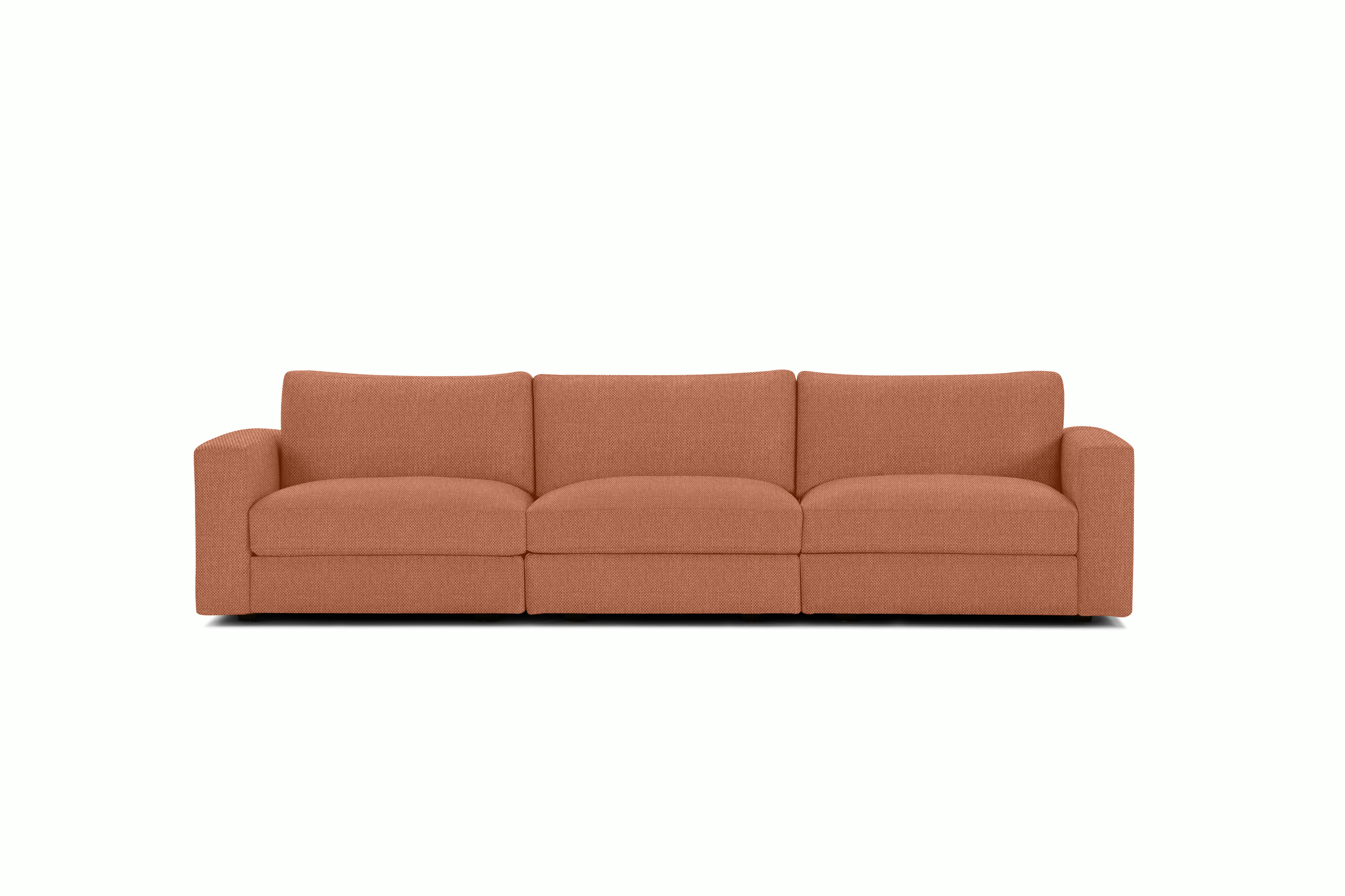 A Reid Sofa in Mode Caramelized viewed from the front.