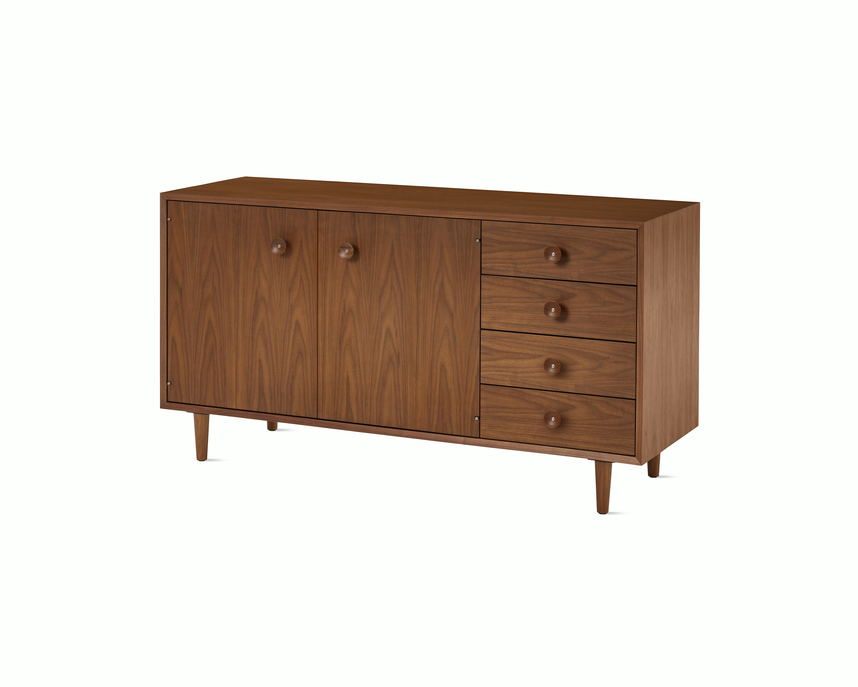 Nelson Basic Cabinet Series Credenza in walnut with two doors, four drawers, taper legs, and cupcake pulls.