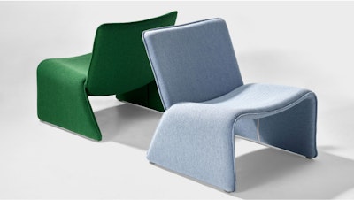 Two Fin Lounge Chairs by NaughtOne, one green and one blue, placed back to back