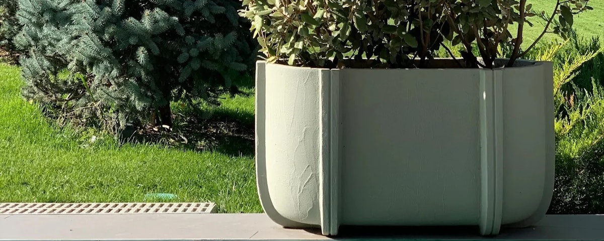 Cassero Planter in an outdoor patio setting