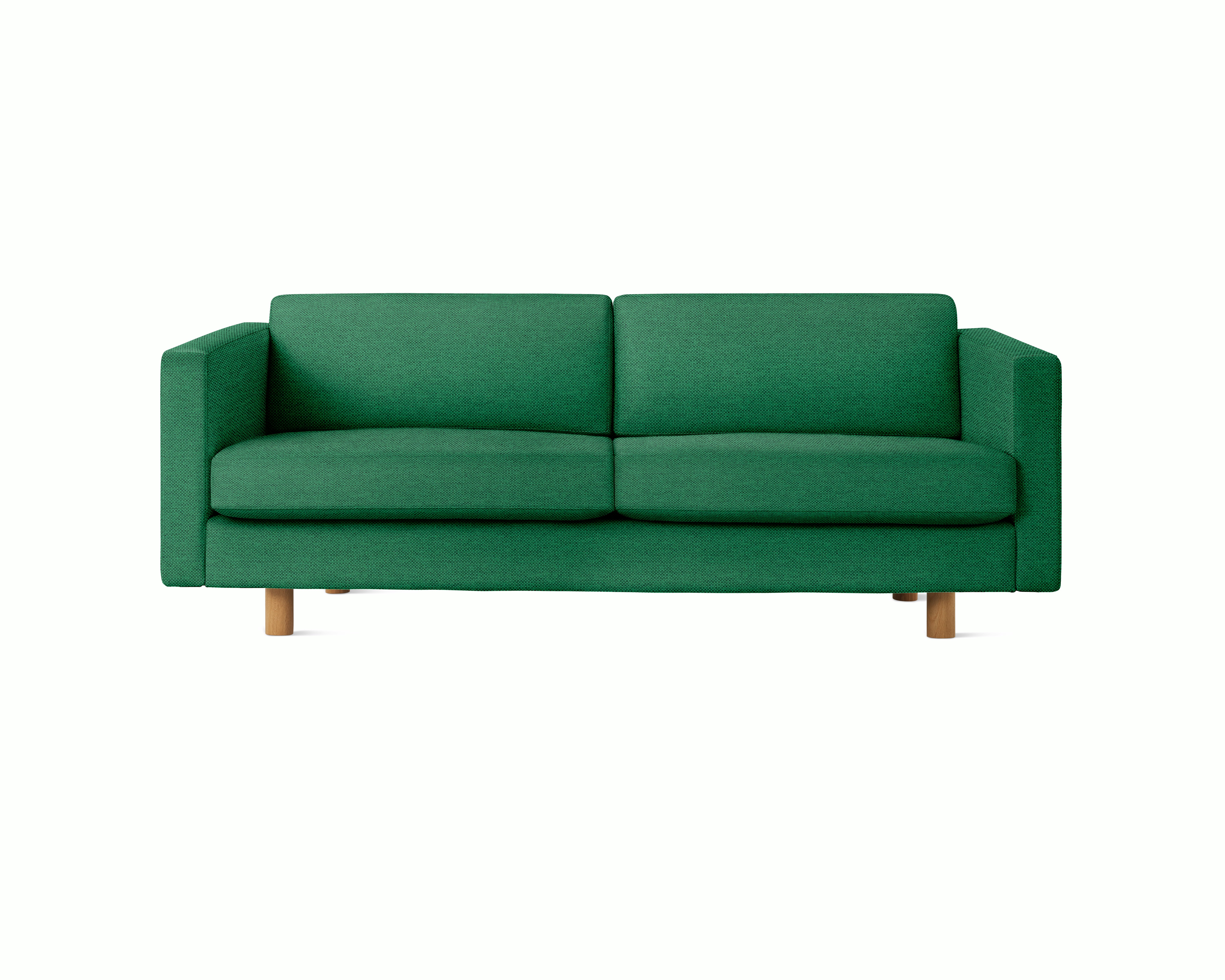 A Lispenard Sofa in Celtic upholstery with oak legs viewed from the front.