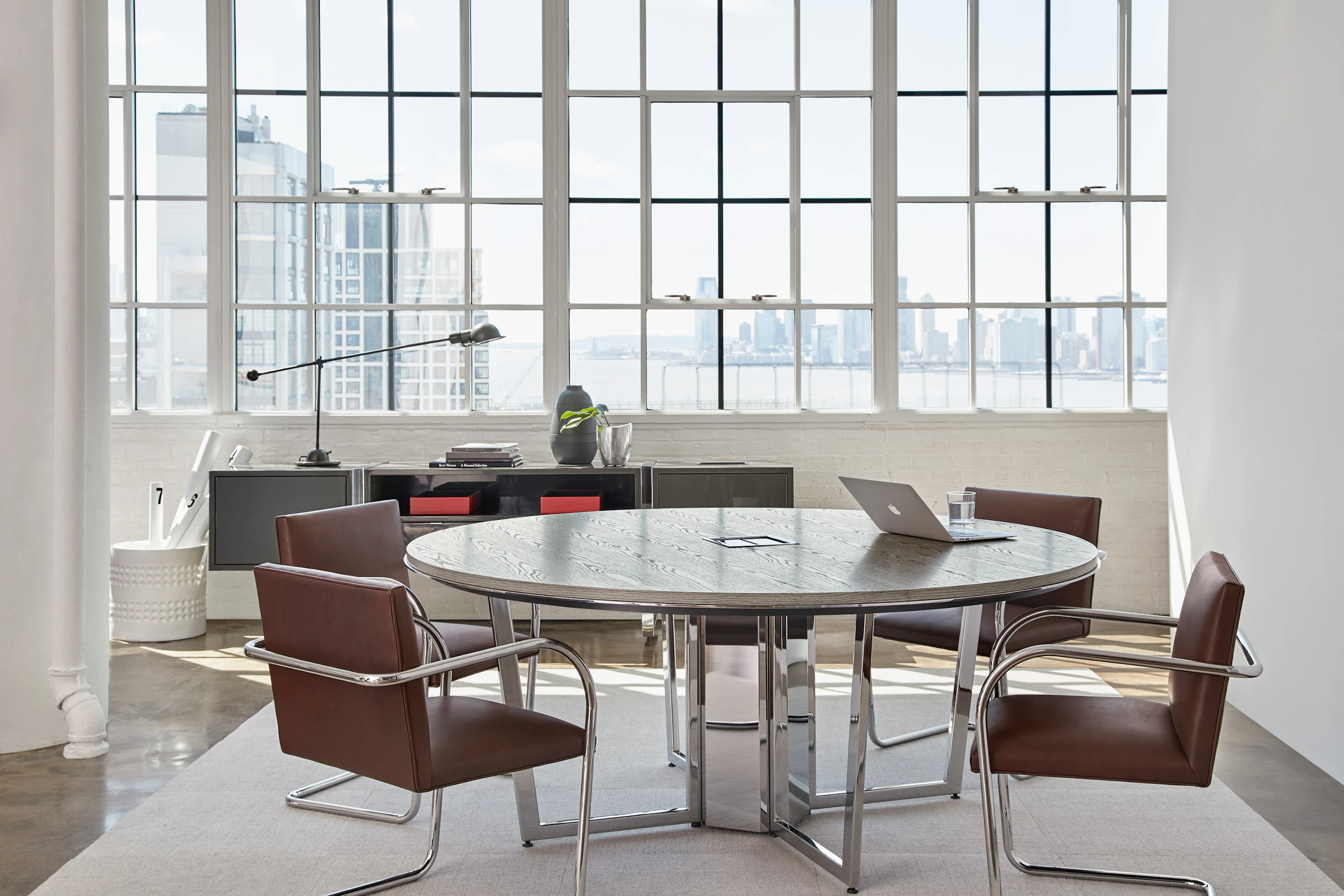 Highline Round Meeting Table in a Meeting Room setting with credenza in background.