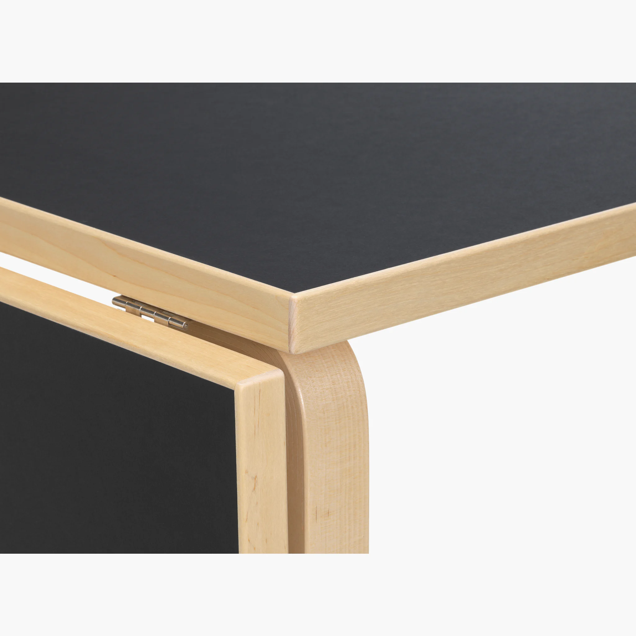 Close-up detail of the table top joining the wooden frame.