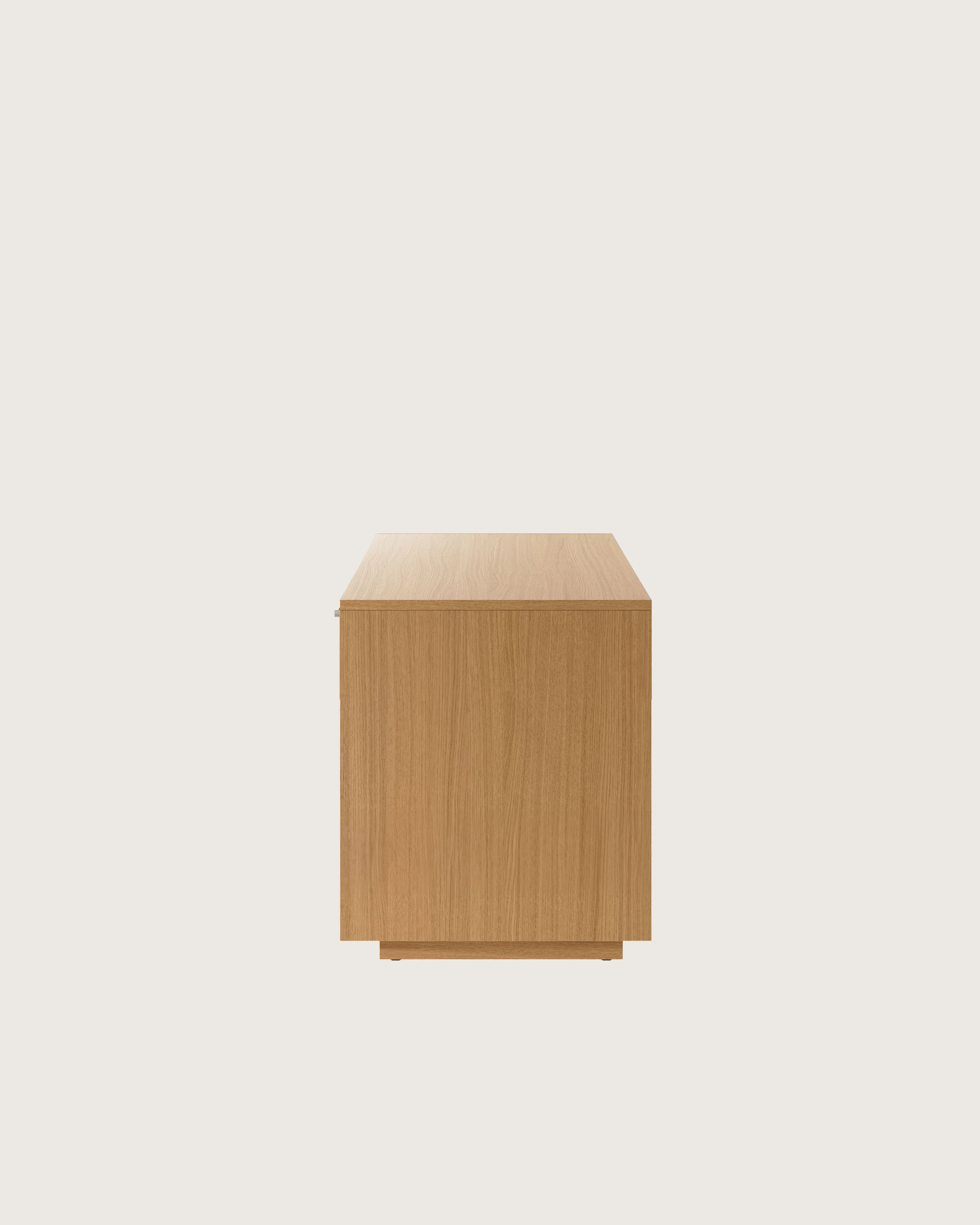JD Credenza in Natural Rift Cut Oak with Satin Nickel drawer pulls viewed from the side.