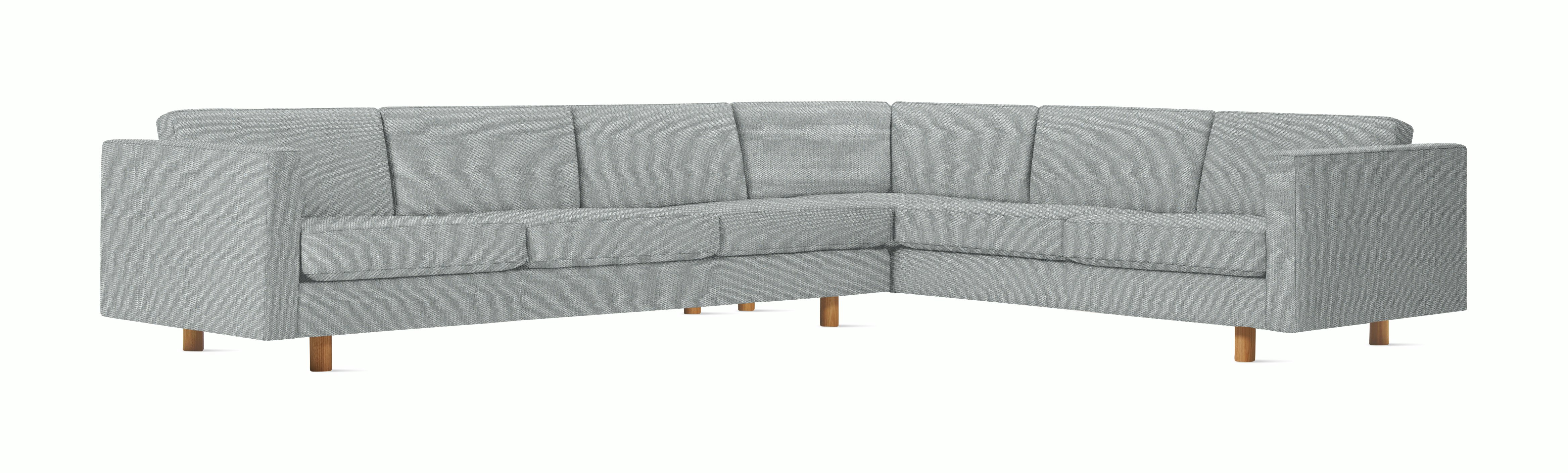 A Lispenard Corner Sectional in Powder with Oak finish viewed from the front.