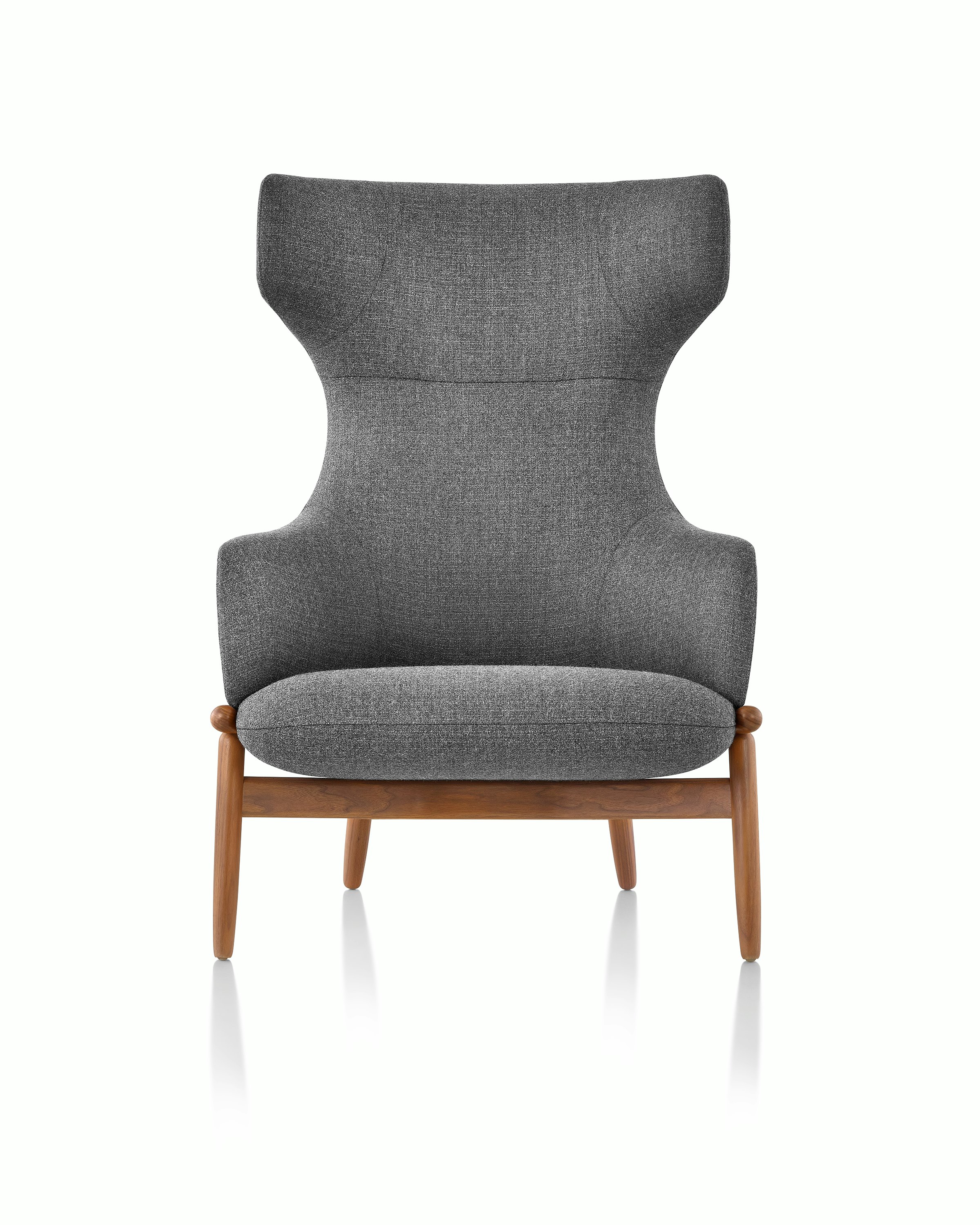 A wing-back Reframe Lounge Chair in Milaner Charcoal, viewed from the front.