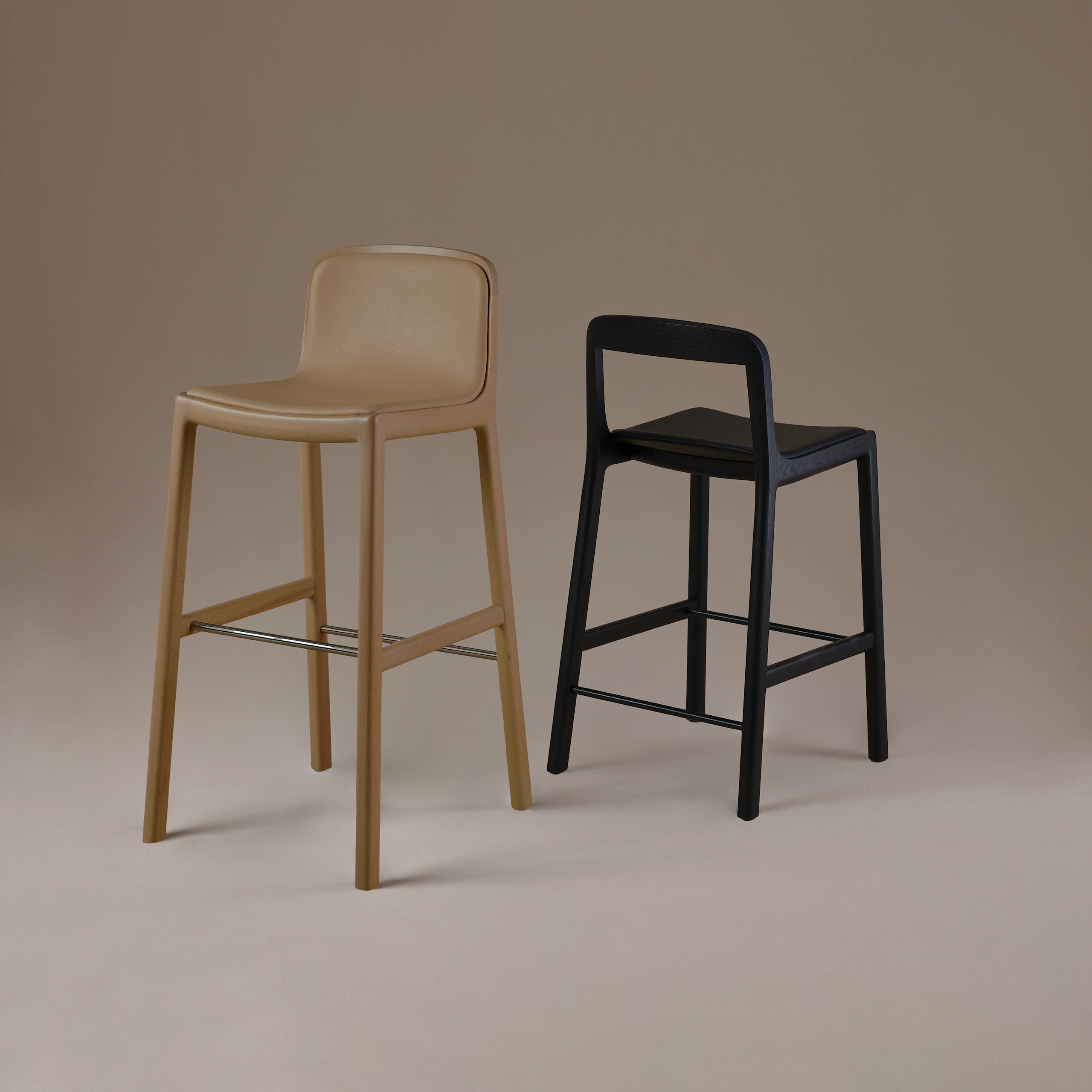 Lijn Stools by Carole Baijings for Geiger in Light Beech and Ebonized Oak on a neutral background.