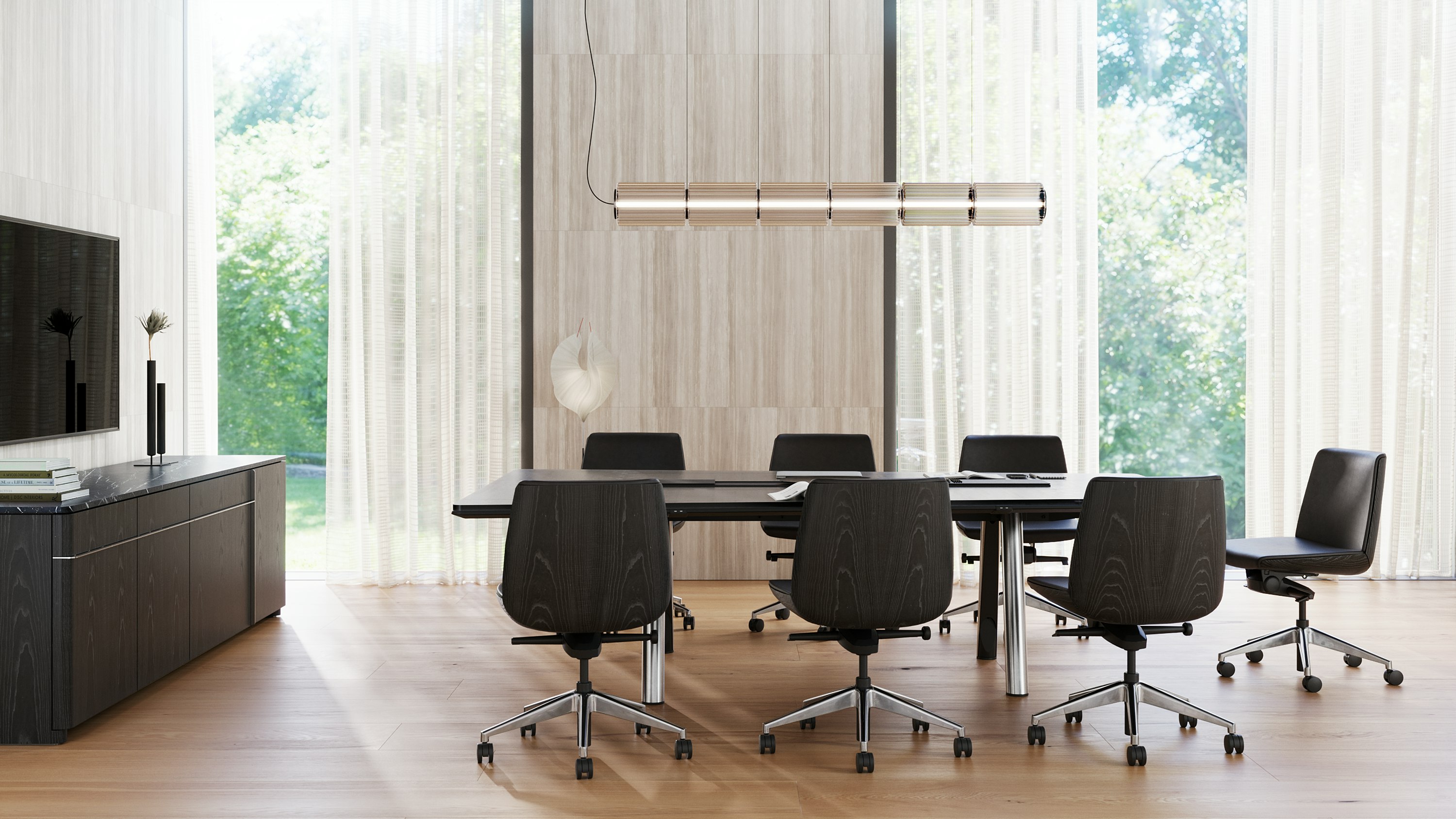 Ascent Conference Table and Credenza by EOOS, paired with Clamshell Chairs, shown with a dark grey etched back-painted glass top and chrome base on the table, viewed from the side in a conference room setting.