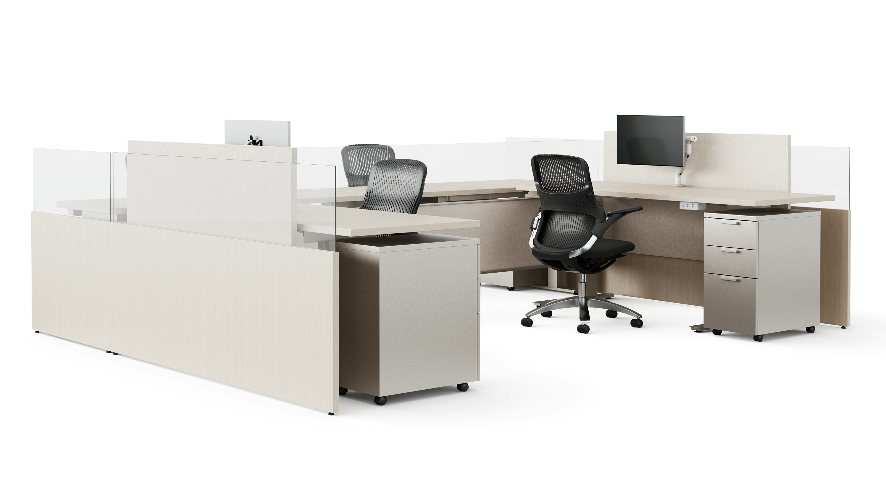 A group of light colored open office workstations are shown at an angle.