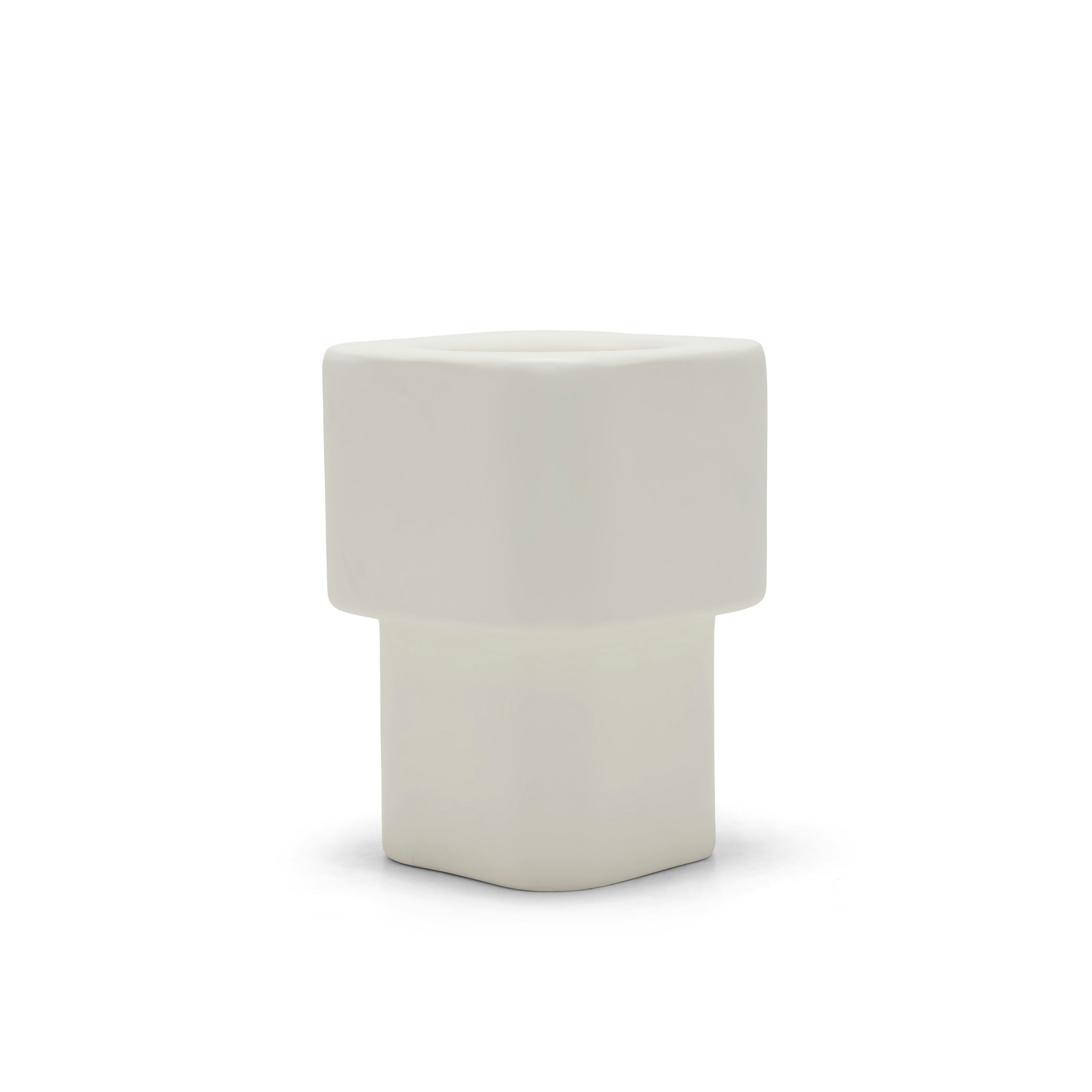A Khouie Planter in white viewed from an angle.