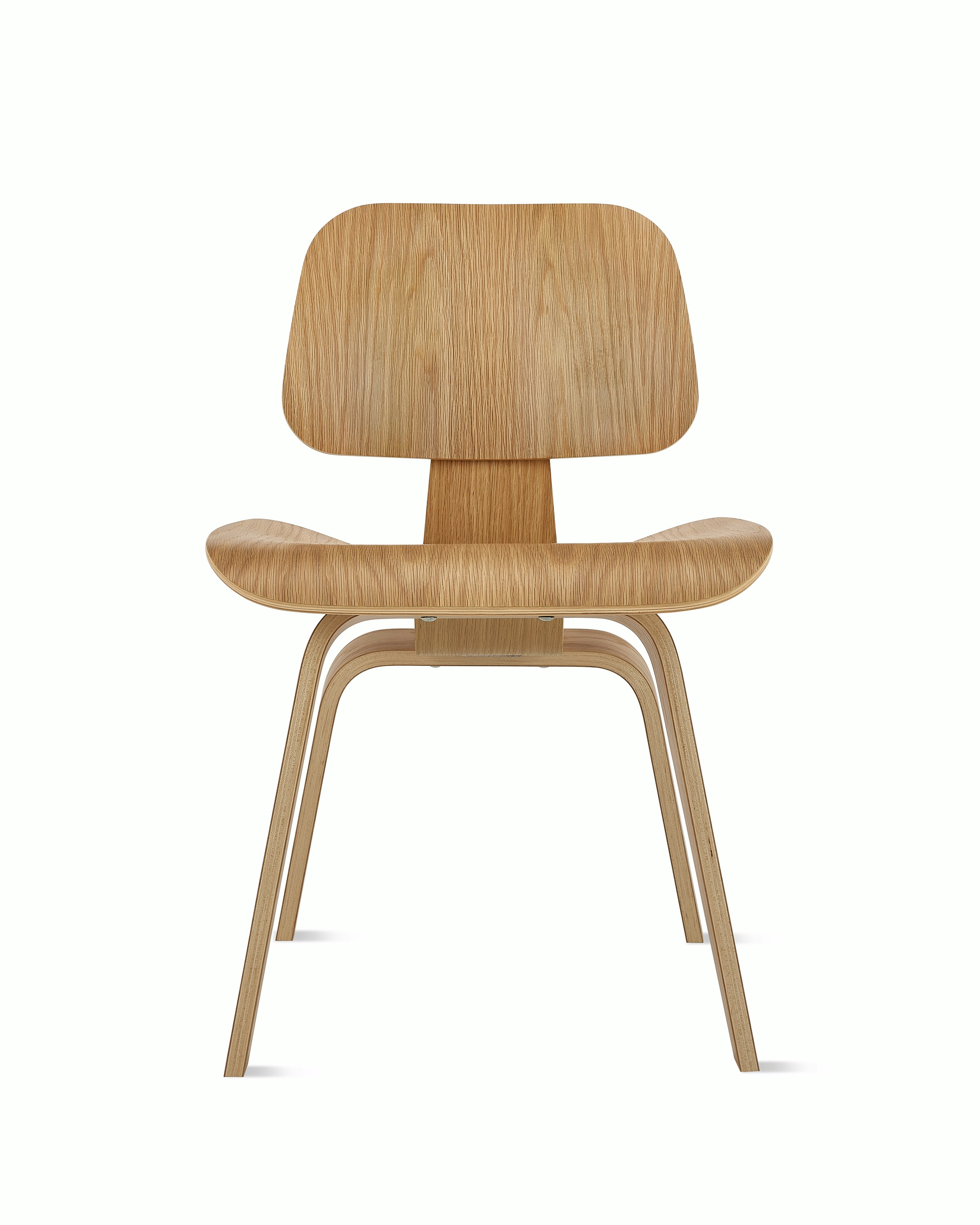An Eames Molded Plywood Dining Chair in White Oak viewed from the front