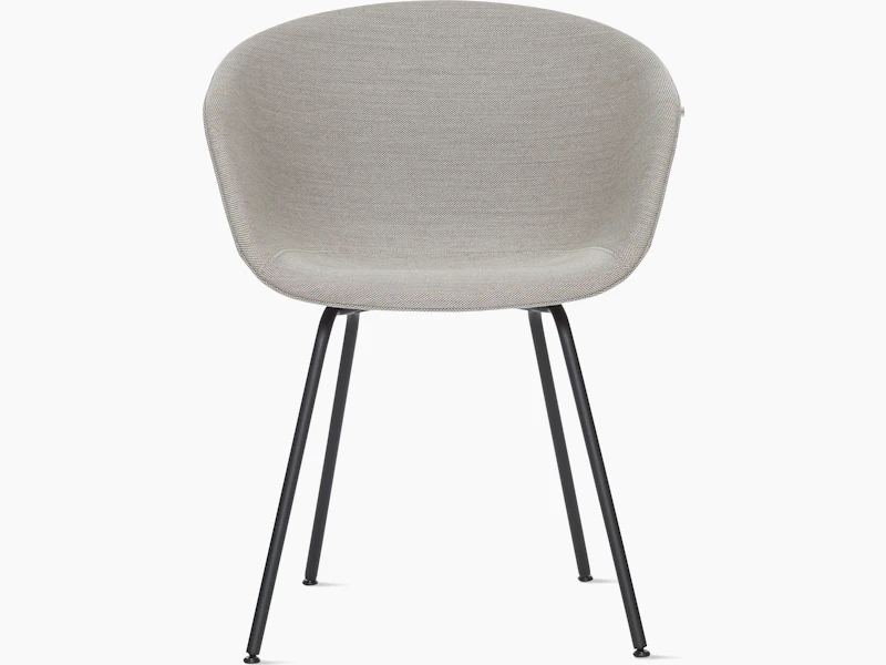 A front view of the AAC 27 About A Chair upholstered armchair with a metal base.