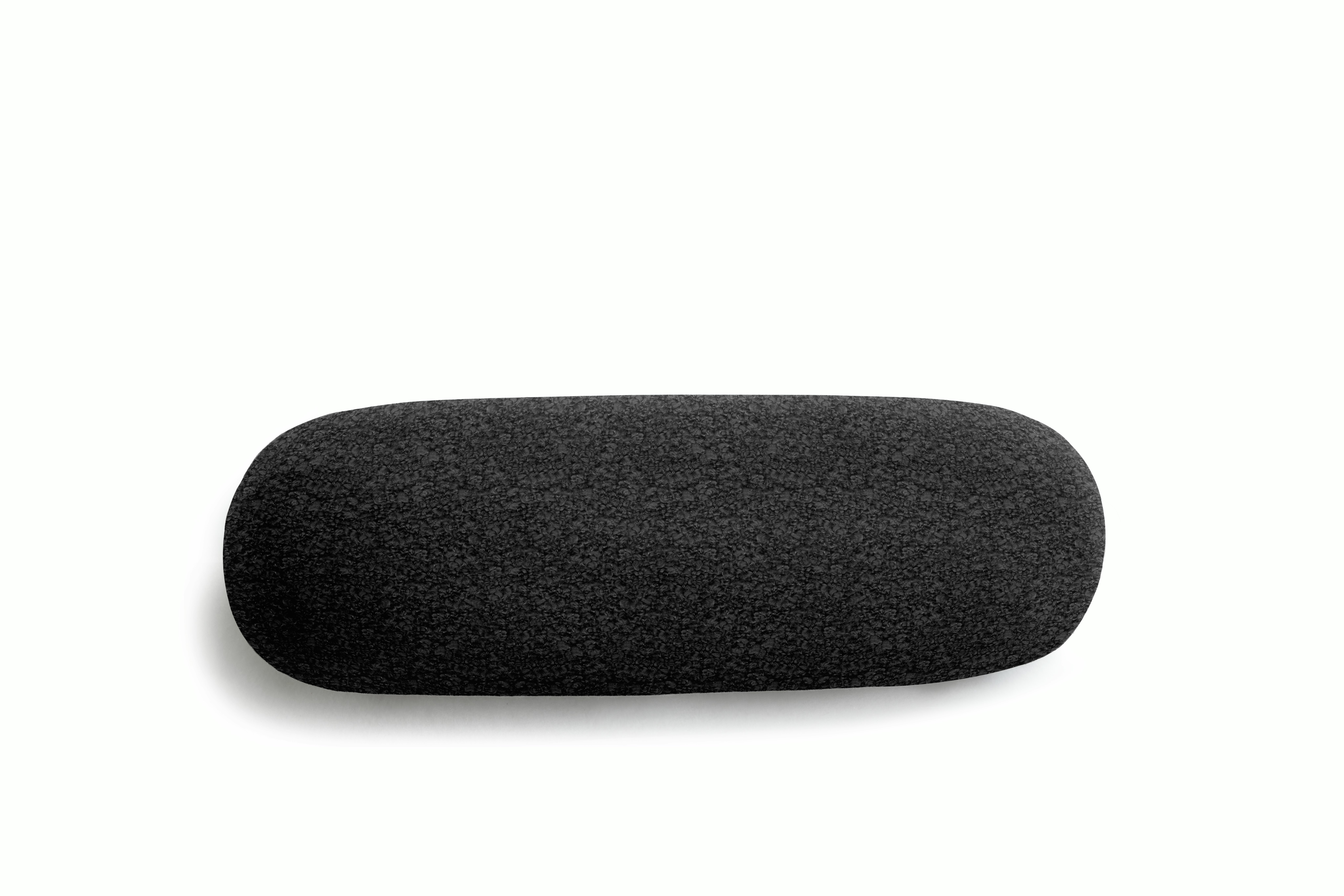 A Biboni Lumbar Pillow in nan viewed from an angle.