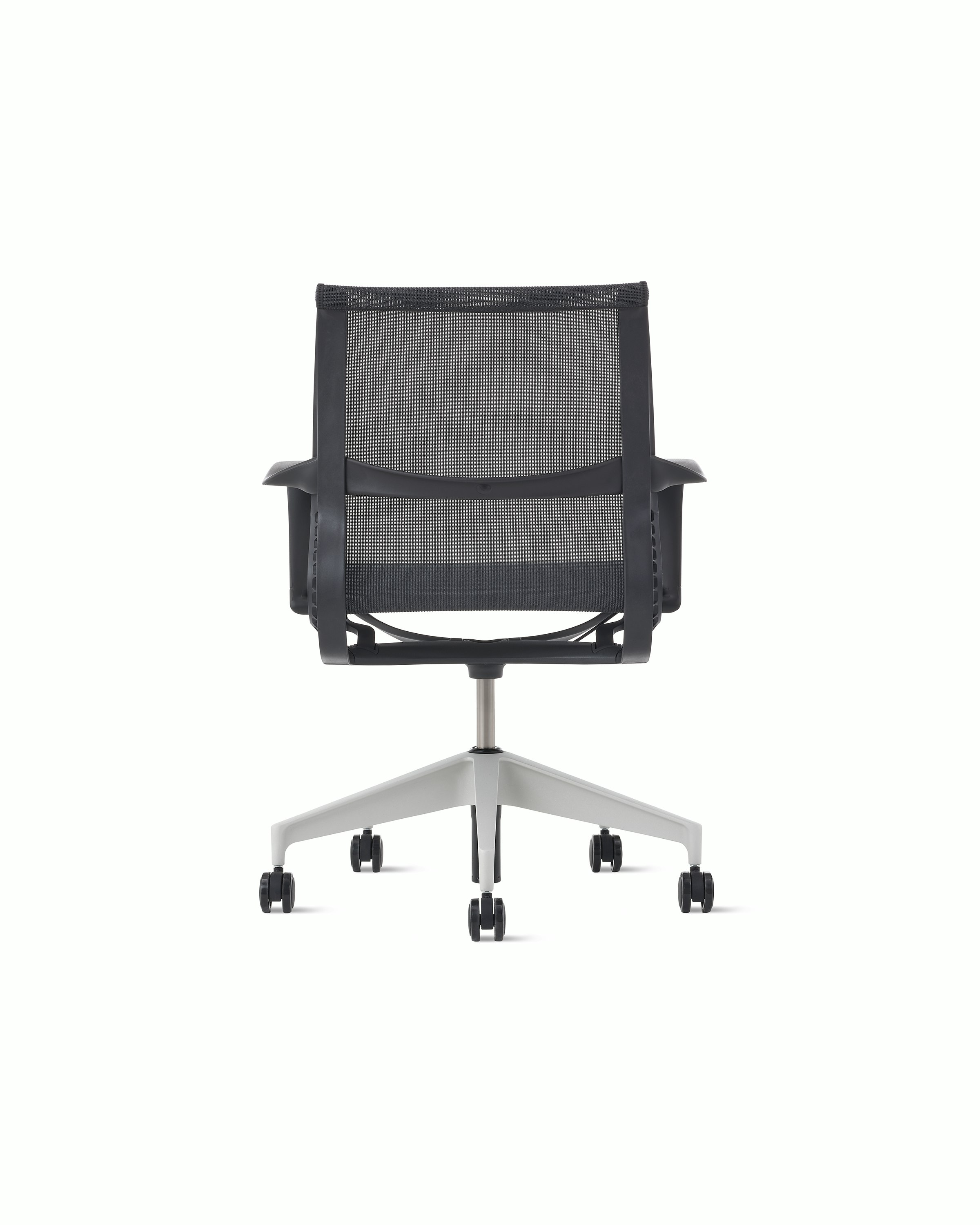 Rear view of a Setu chair in dark grey with a silver alloy base.