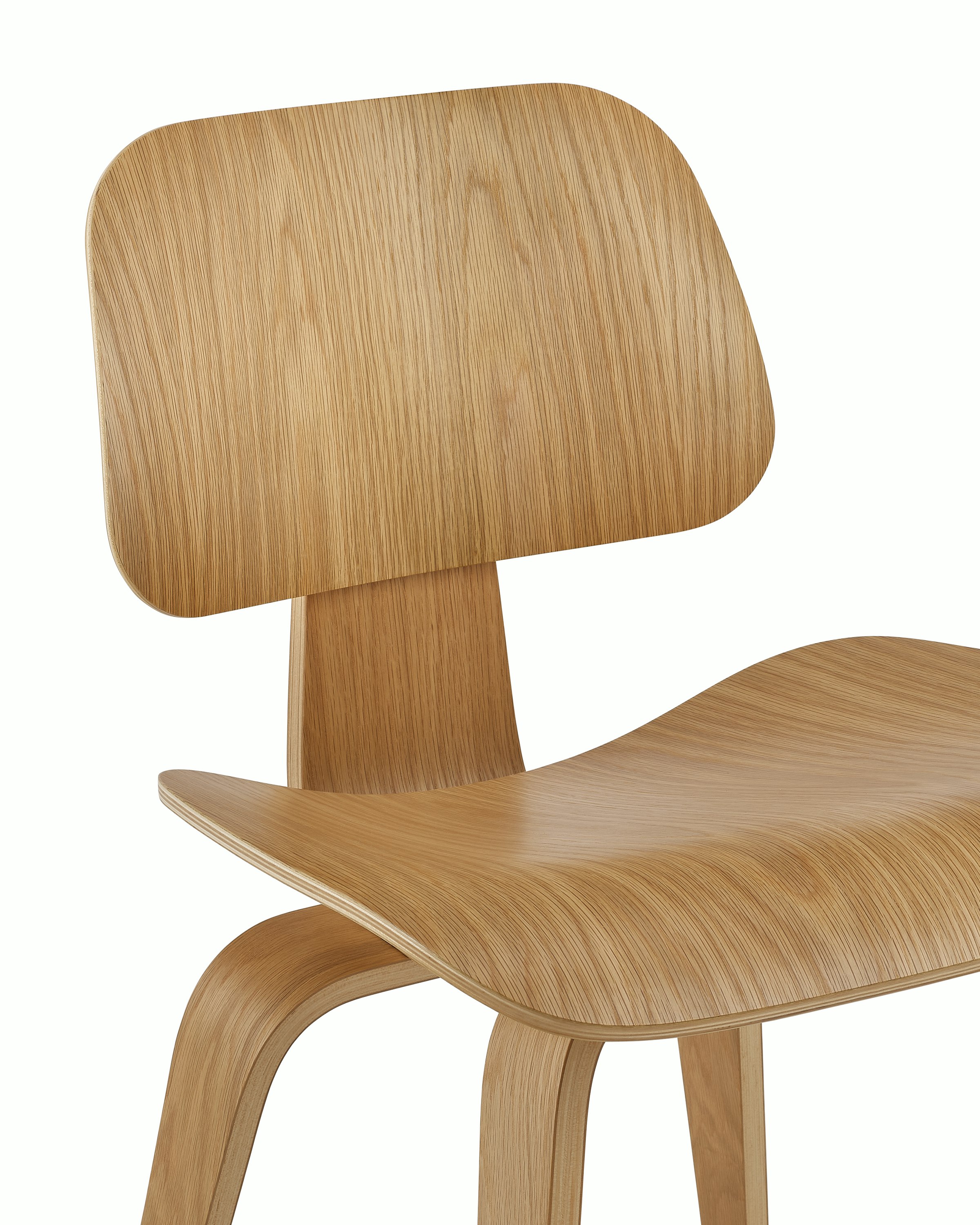 An Eames Molded Plywood Dining Chair in White Oak detail