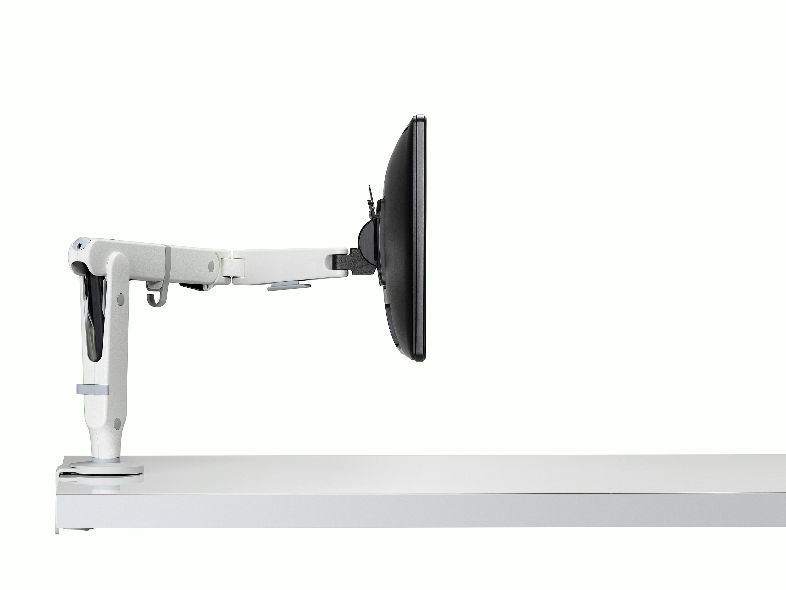 Ollin single monitor arm white viewed from the side.