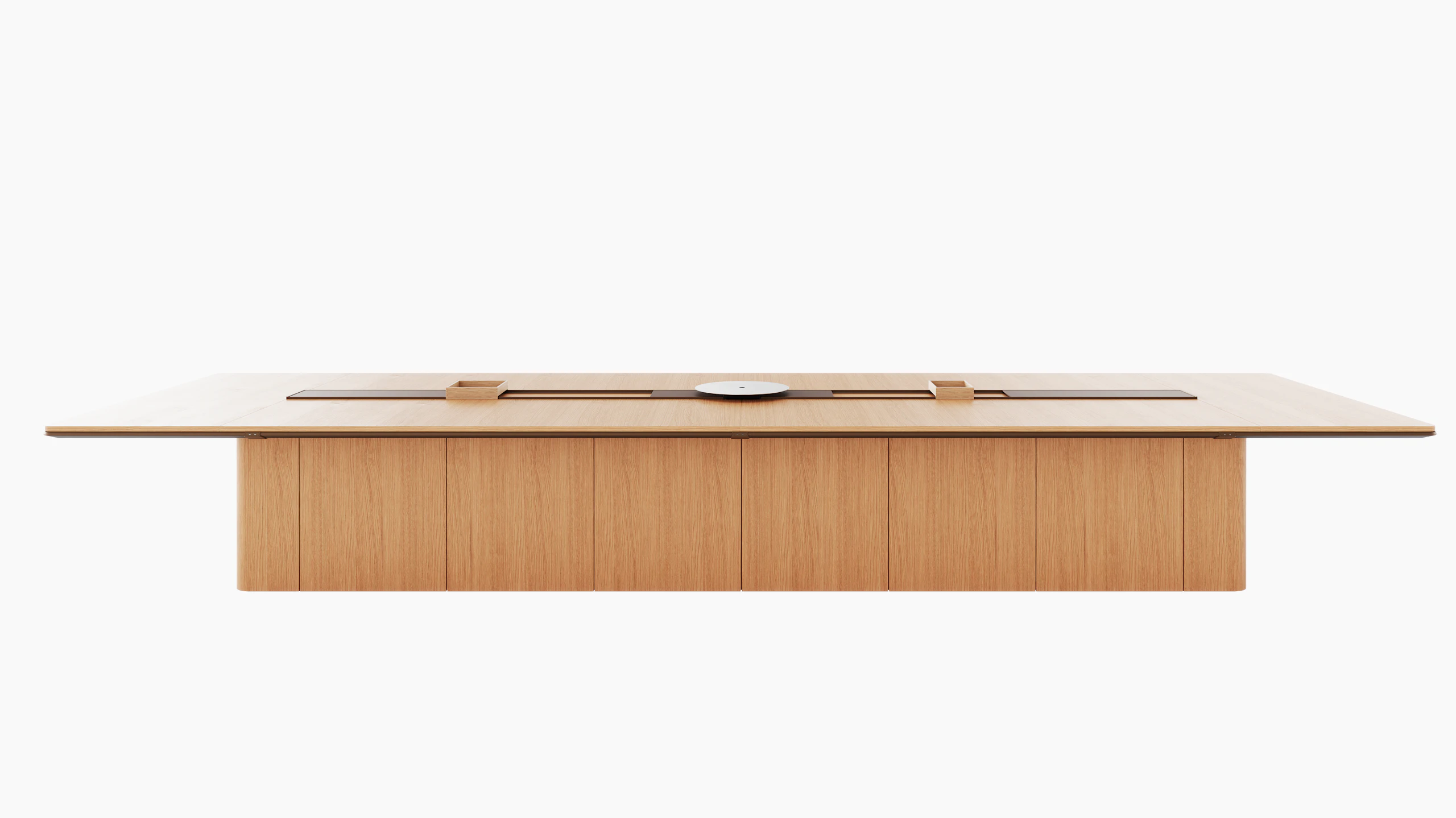 60"×204" Ascent Conference Table designed by EOOS in Natural Rift Cut Oak with a plinth base, central power trough, an AV platform, and accessory trays, viewed from the front.