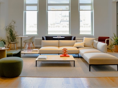 An arranged living room space at the NaughtOne display in the MillerKnoll New York showroom.