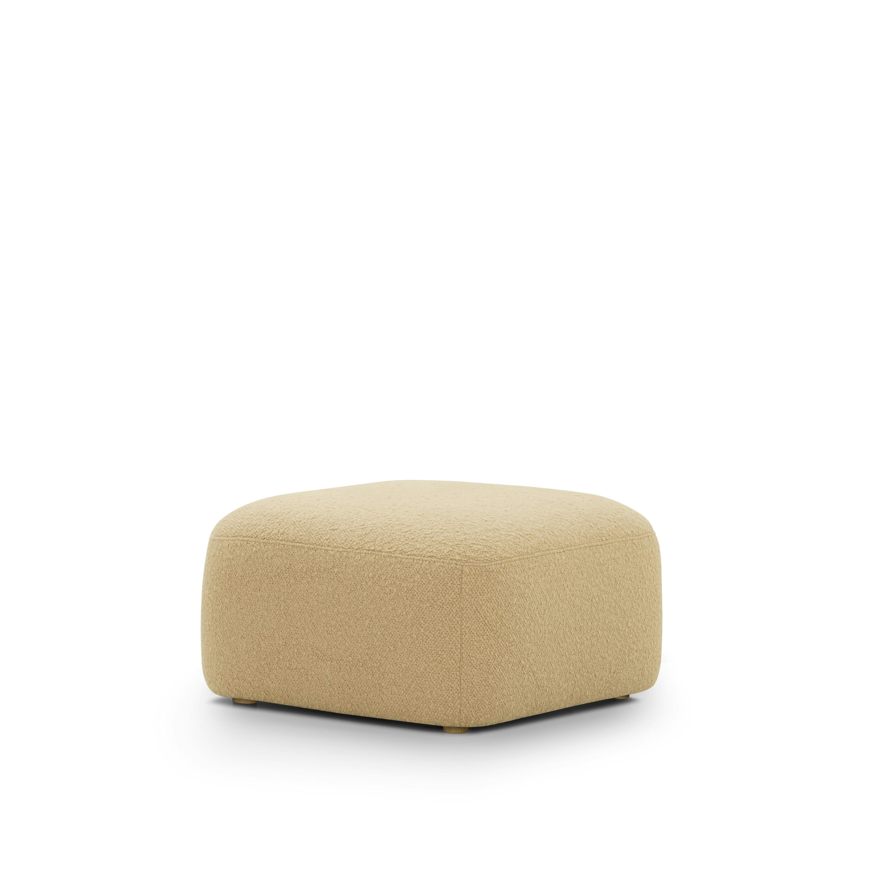 A Muse Ottoman in Airlie: Camel viewed from an angle.