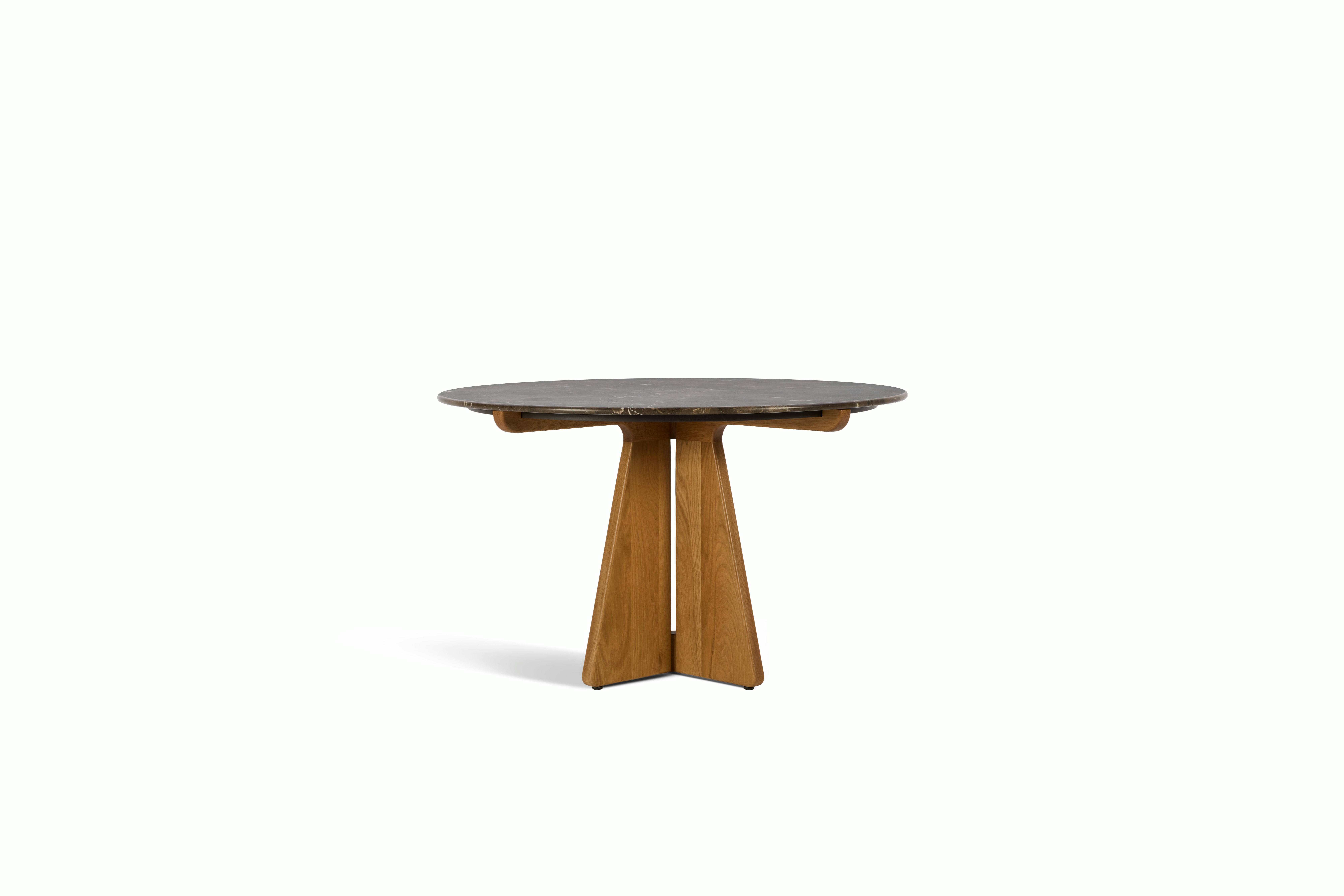 A Pinna Dining Table in Oak Espresso viewed from an angle.