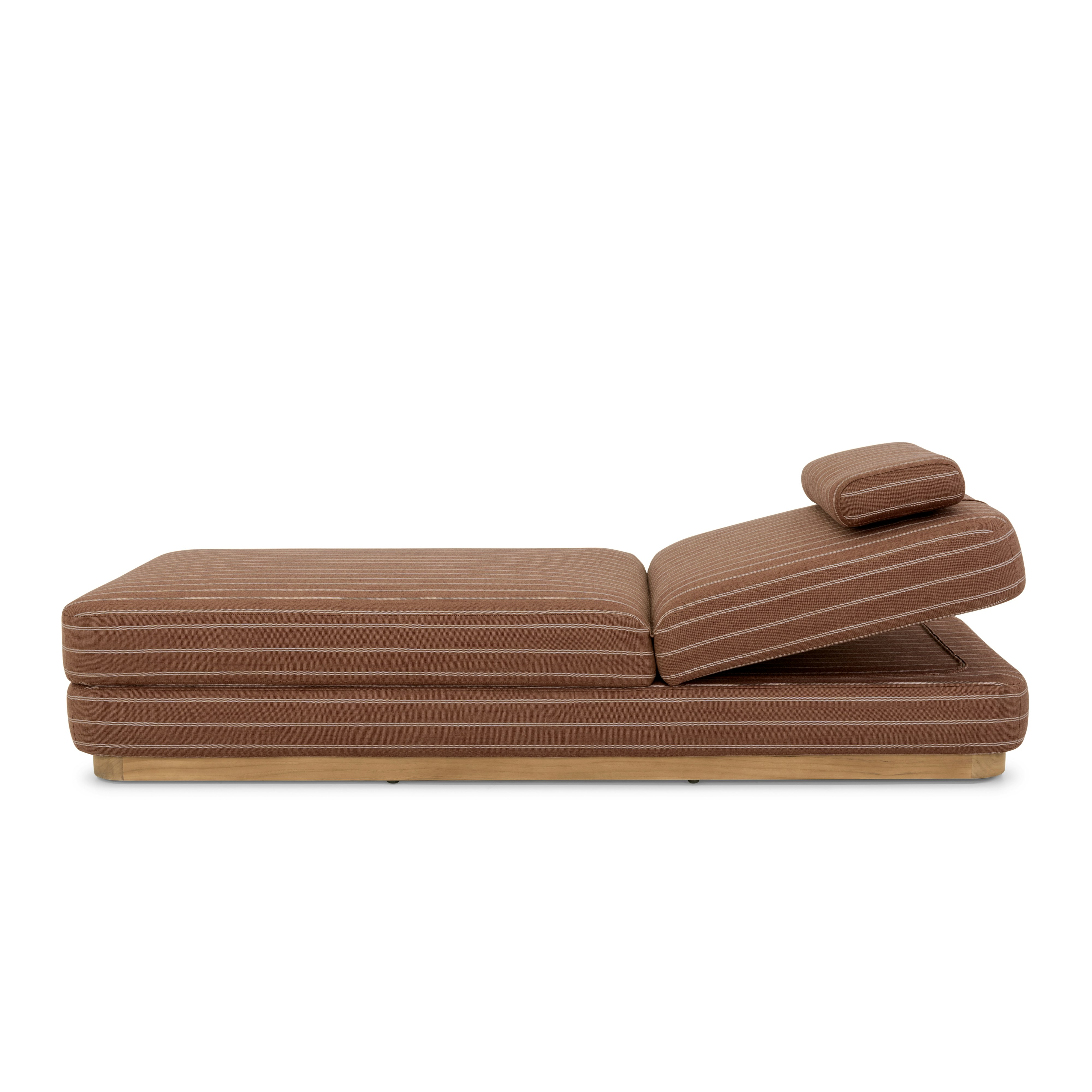 A Stack Outdoor Chaise in Terra Rossa viewed from the side.