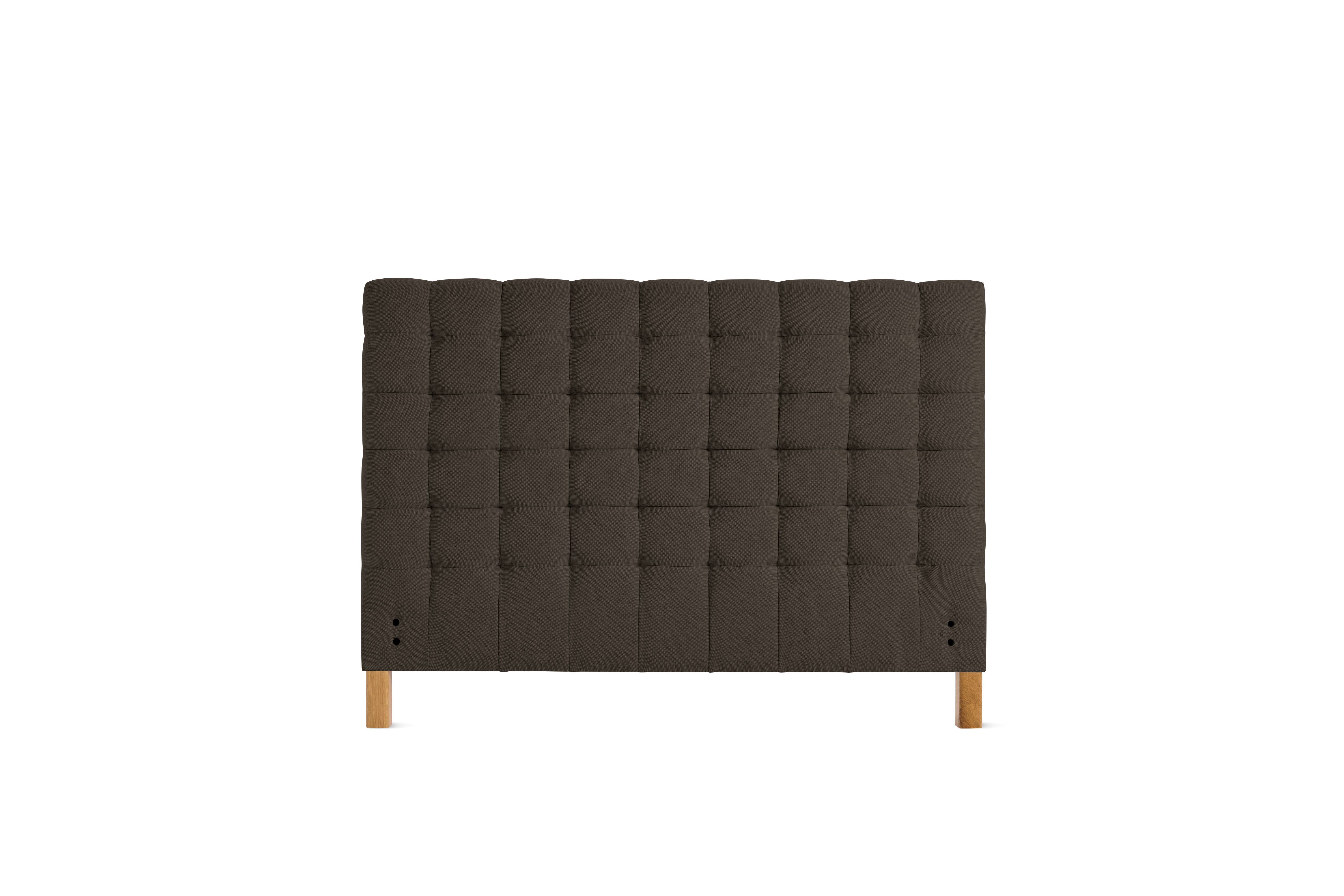 A Madeleine Headboard in Mode, Hollow, Oak viewed from the front.