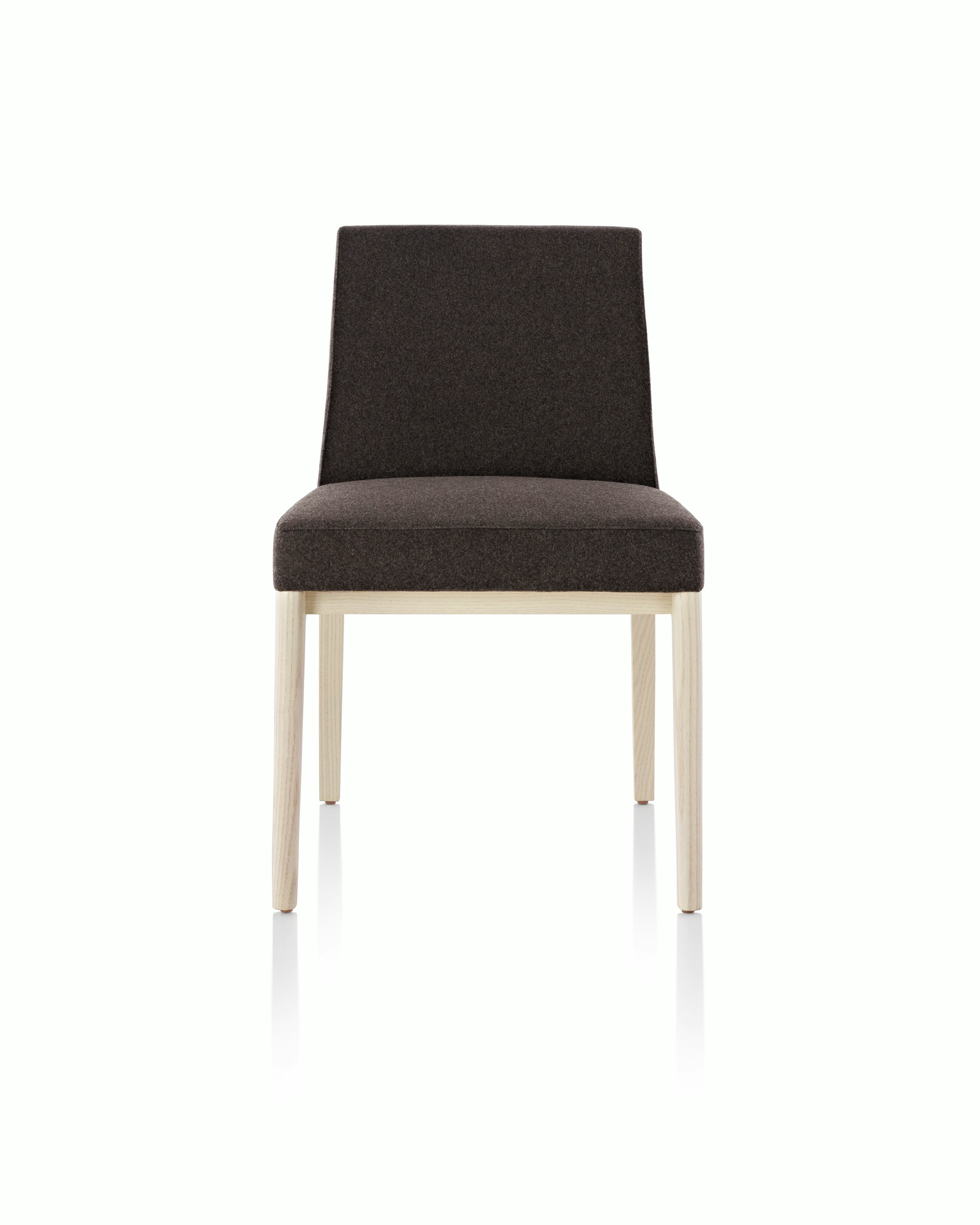 An armless Nessel side chair with black fabric upholstery and a wood frame with a light finish, viewed from the front.