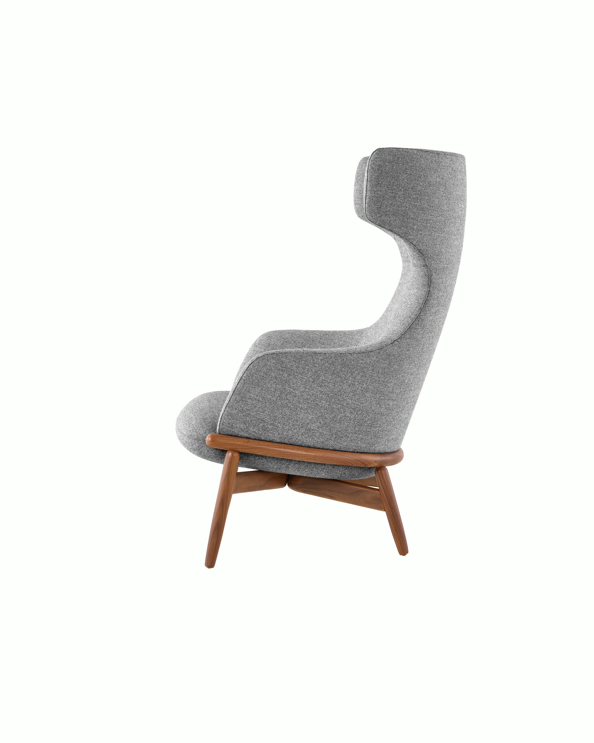 A wing-back Reframe Lounge Chair in Panno Di Dolce Flannel, viewed from the side.