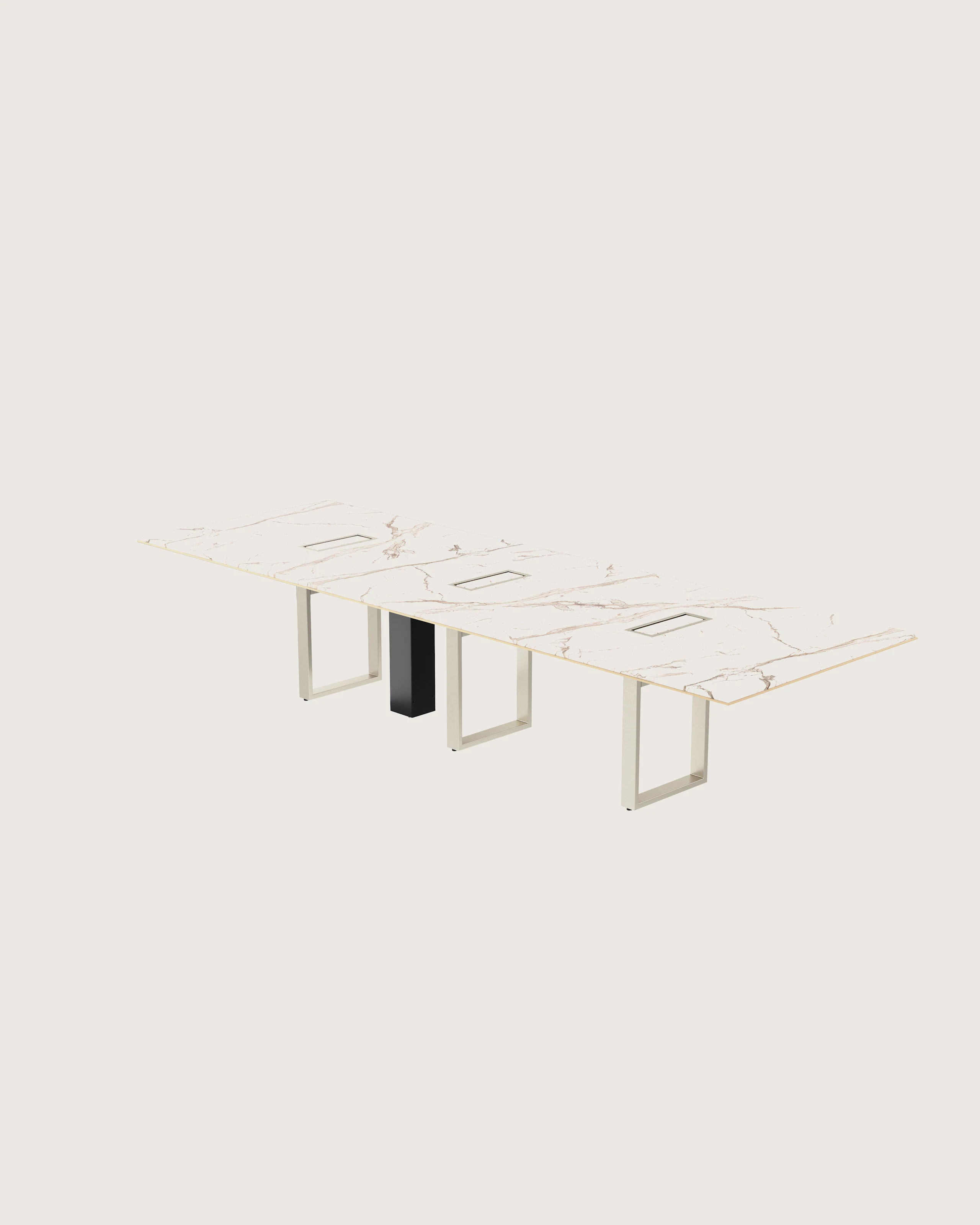 Highline Conference Table in Calacatta Gold Stone with leather edge detail and Satin Nickel base viewed from a 45 degree angle.