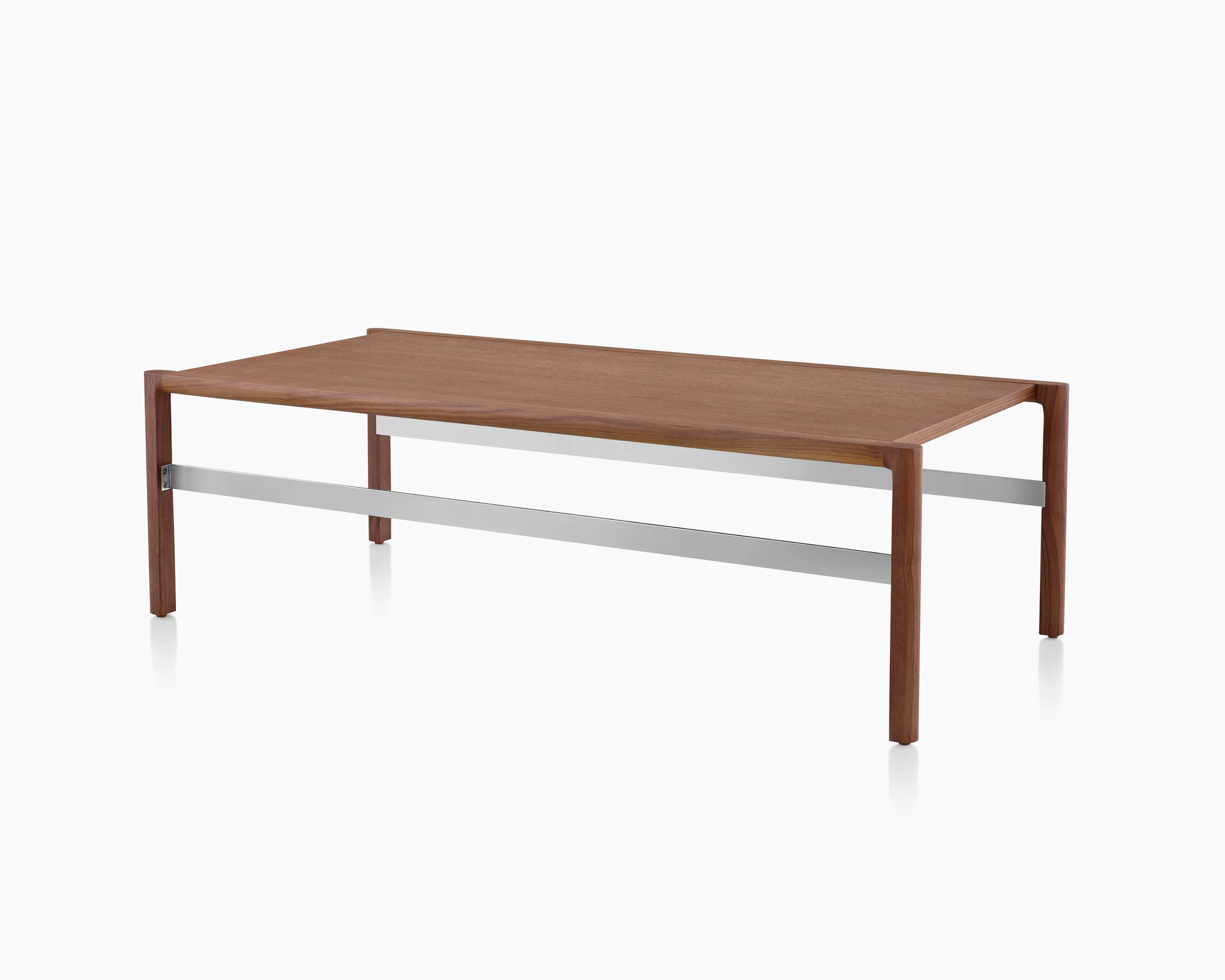 A rectangular Brabo Table with a wood top and metal frame supports, viewed at an angle.