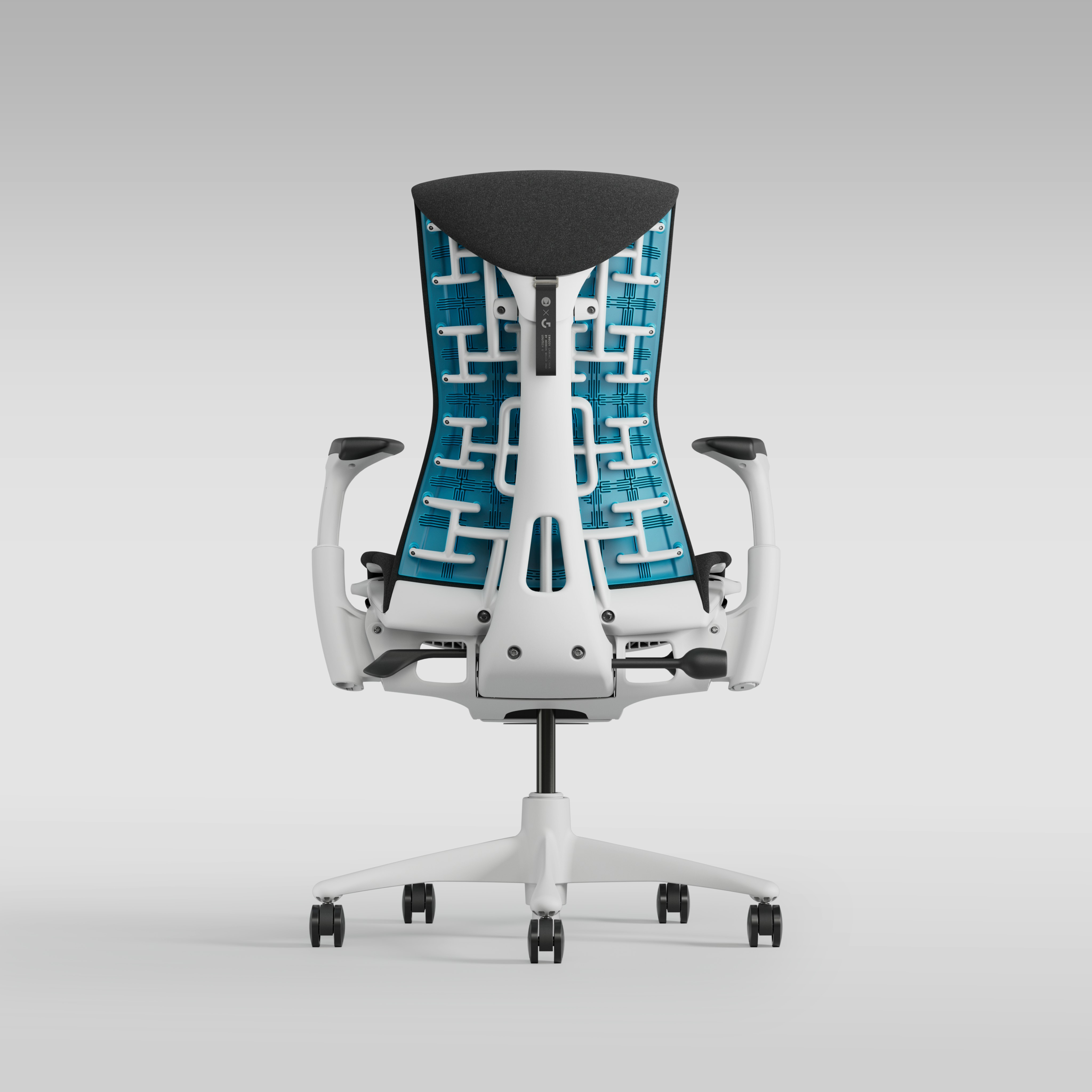 Embody Gaming Chair in White, Black and Cyan viewed from the back
