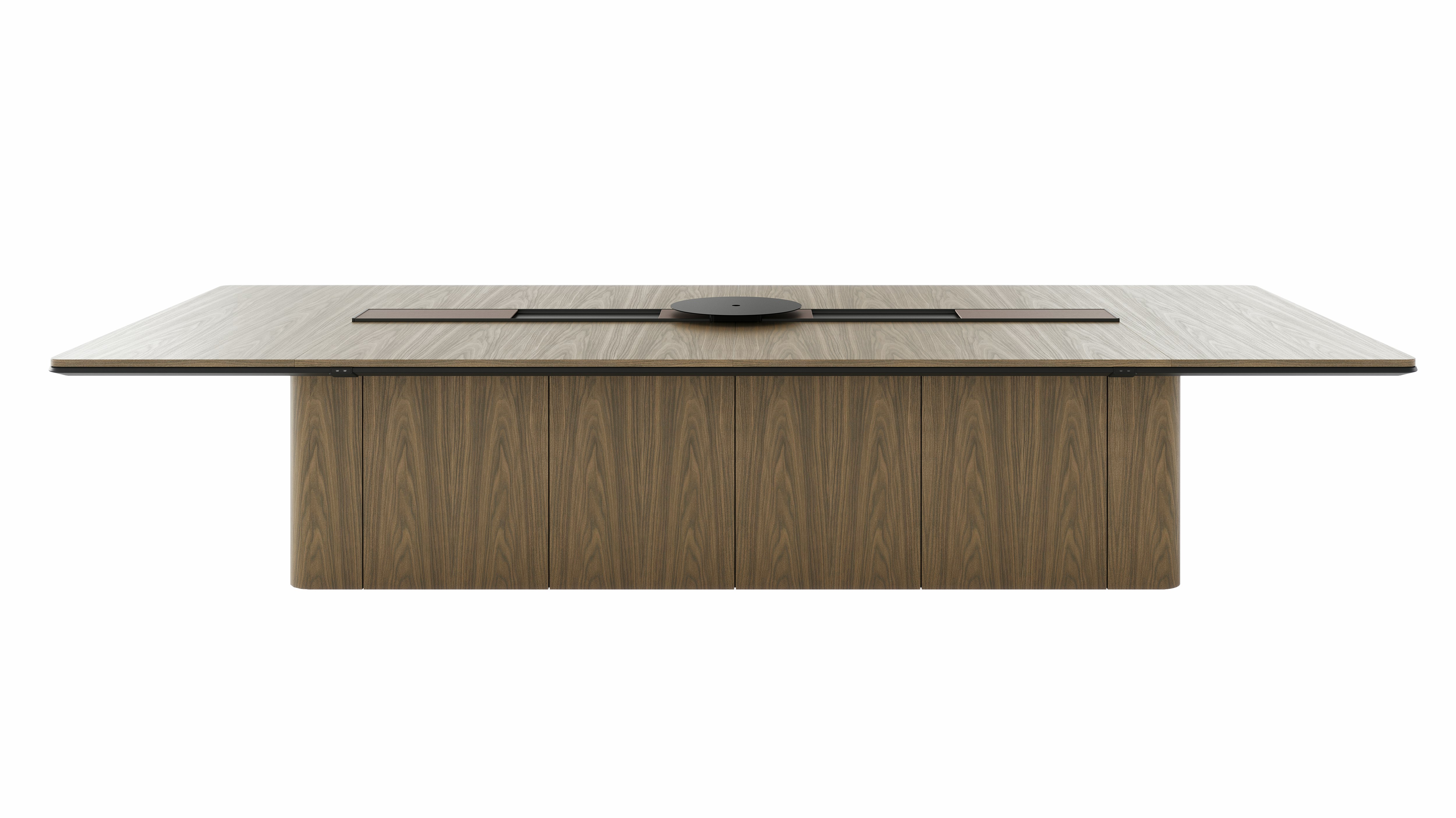 60"x144" Ascent Conference Table designed by EOOS in Natural Flat Cut Walnut with a plinth base, central power trough, an AV platform, and accessory trays, viewed from the front.